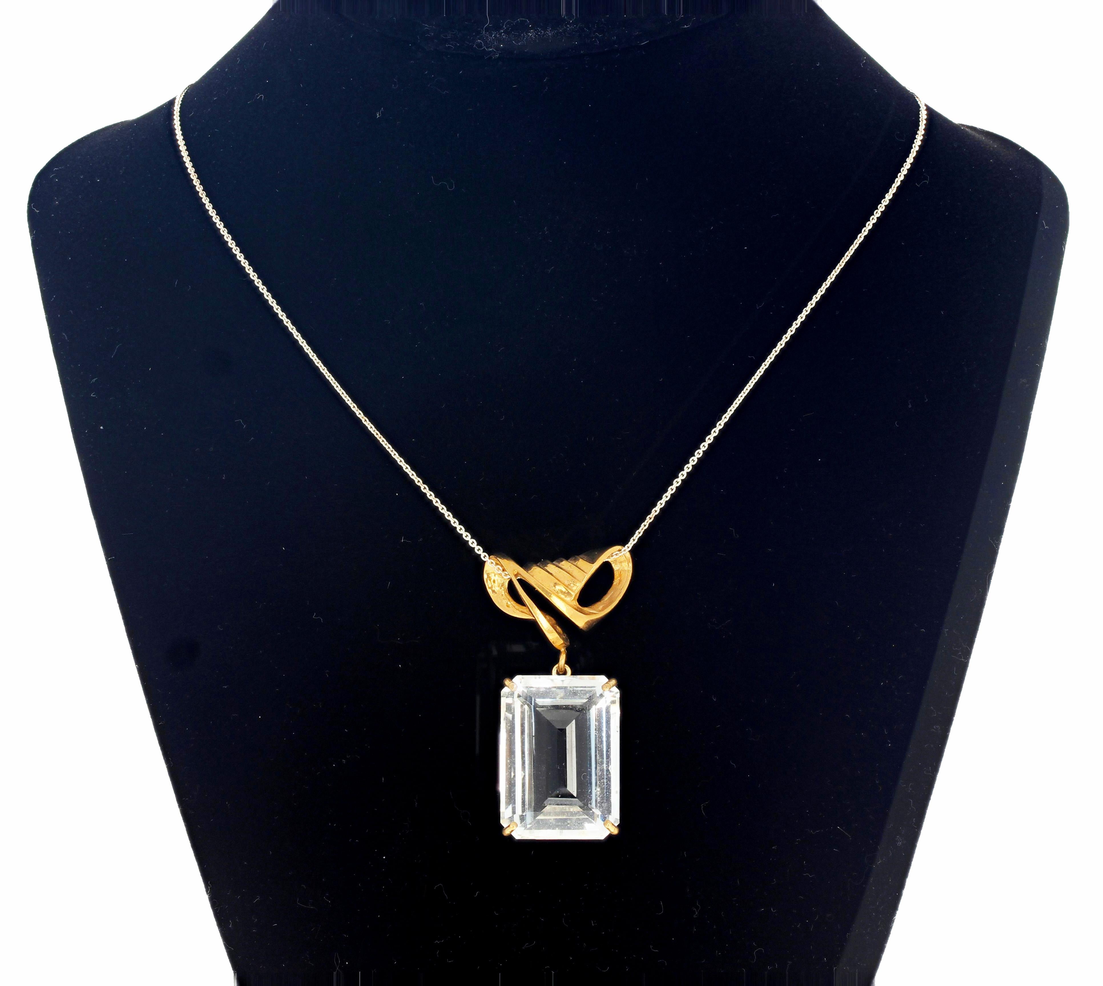 This superbly elegant style magnificent large solitaire Goshenite 14K yellow gold pendant measure a whopping 18 mm x 25 mm and is 33 carats.   Its too clear to photograph so although it looks greyish it is clear white transparently translucently