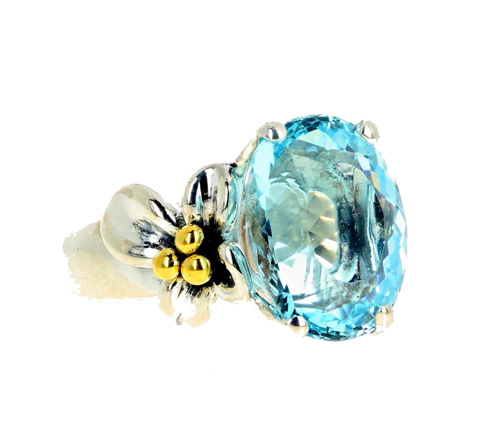 This gorgeous natural 11 Carat intense blue Aquamarine is 16mm x 13.5mm set in an 18K yellow gold and sterling silver  ring size 7 sizable.  This comes from one of the most famous mines in the world and is intensely blue and glittery with no eye