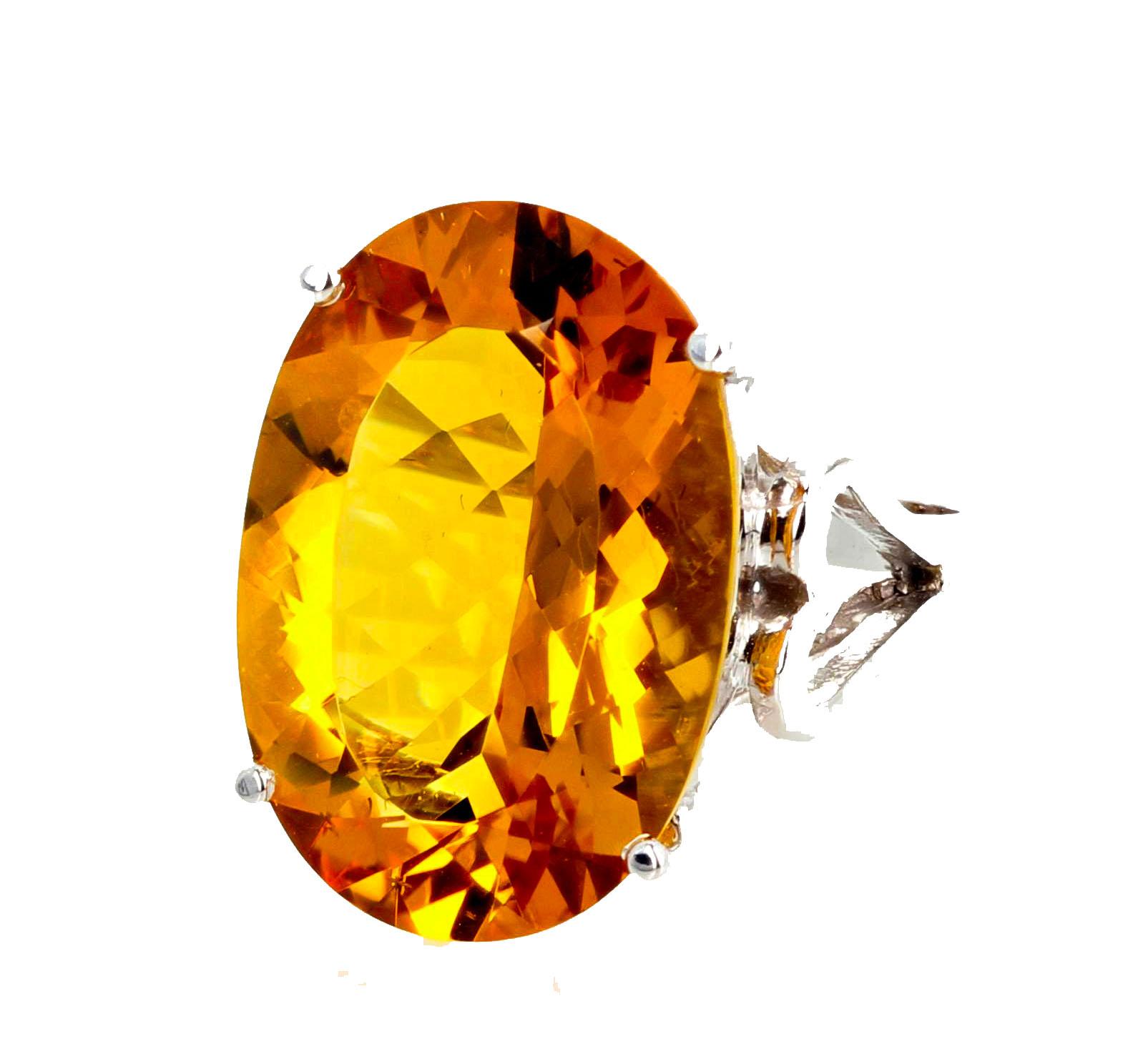 This Movie Star collection ring is a red carpet show stopper.  This is a large oval 14.5Ct Goldy Yellow Citrine solitaire.  This gemstone is 20mm x 14mm x 5.5mm deep and has no apparent eye visible inclusions.  You will feel like the queen of the