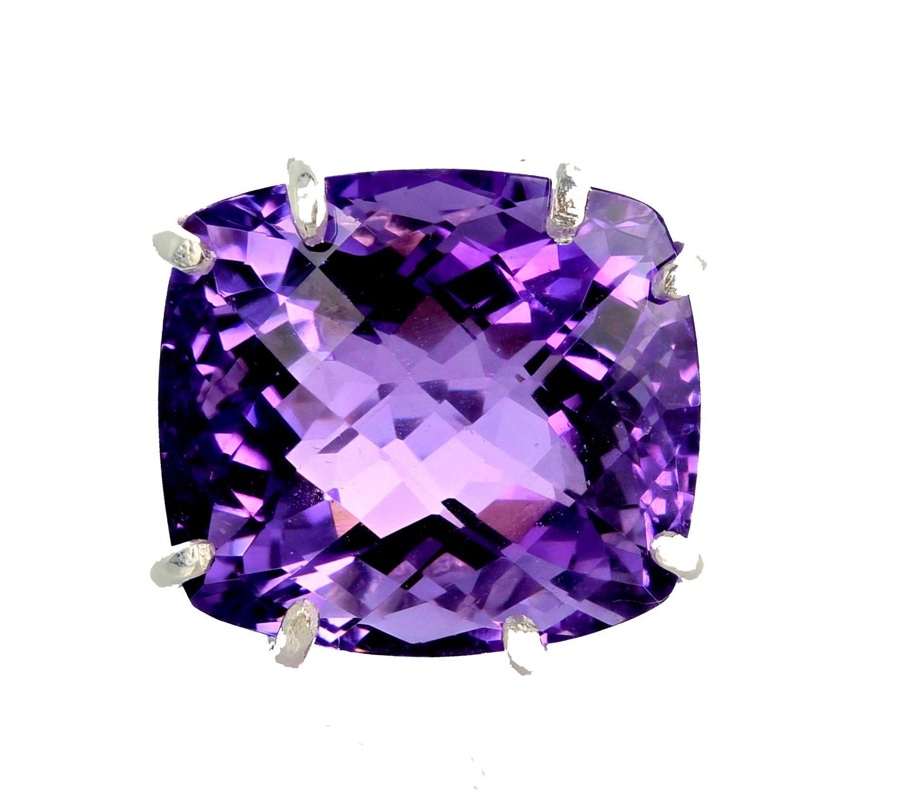 The ultimate red carpet ring for every occasion.  You will be amazed by the huge generous size of this checkerboard cushion cut 44 Ct. pinky purple show stopper solitaire.  This 22mm x 20mm sterling silver ring design sets the gemstone high up on