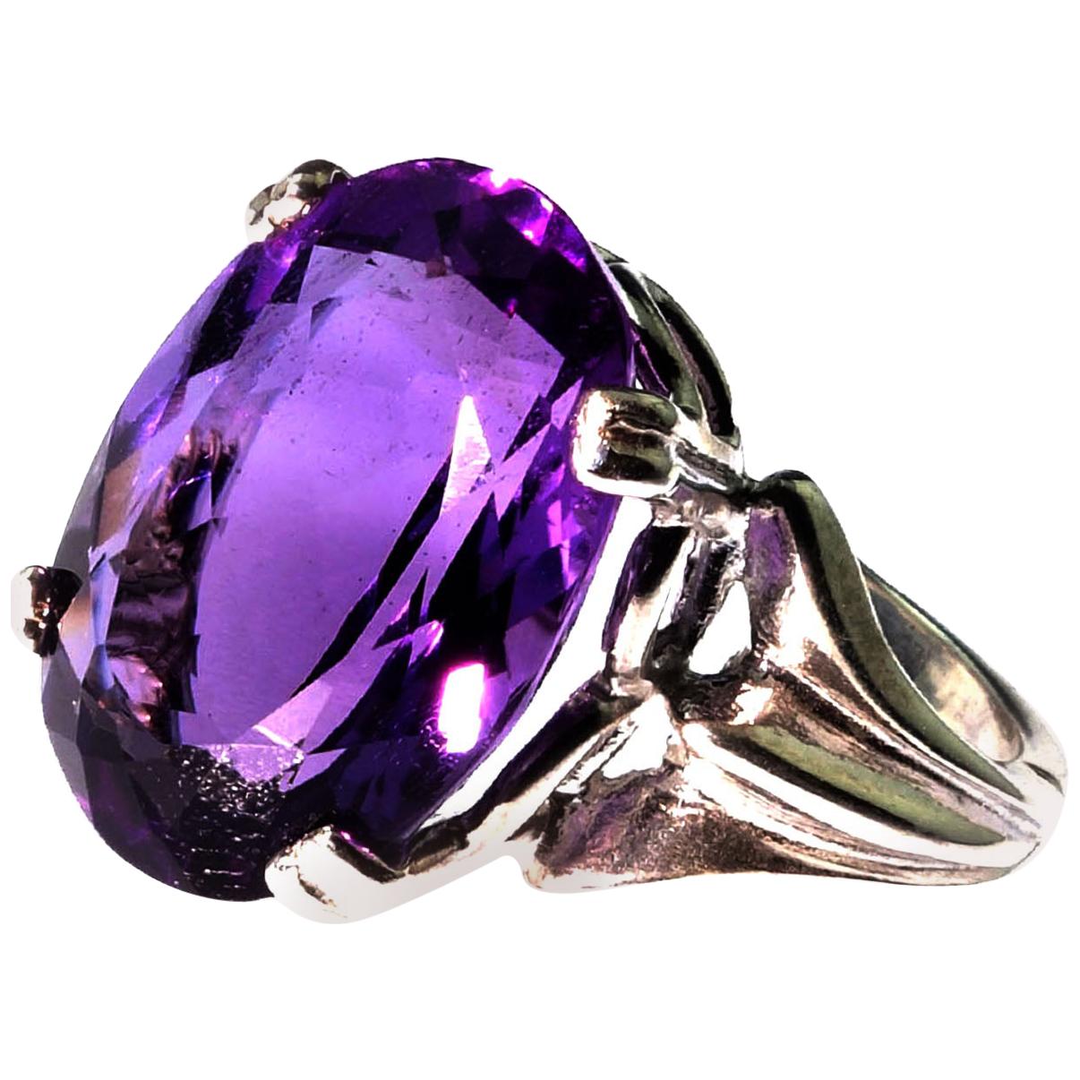 Custom made, sparkling oval Amethyst set in Sterling Silver ring with delightful detail.  This exceptional Brazilian Amethyst flashes purple and pink!  It comes from one of our favorite suppliers in the mountains outside of Rio de Janeiro.  This