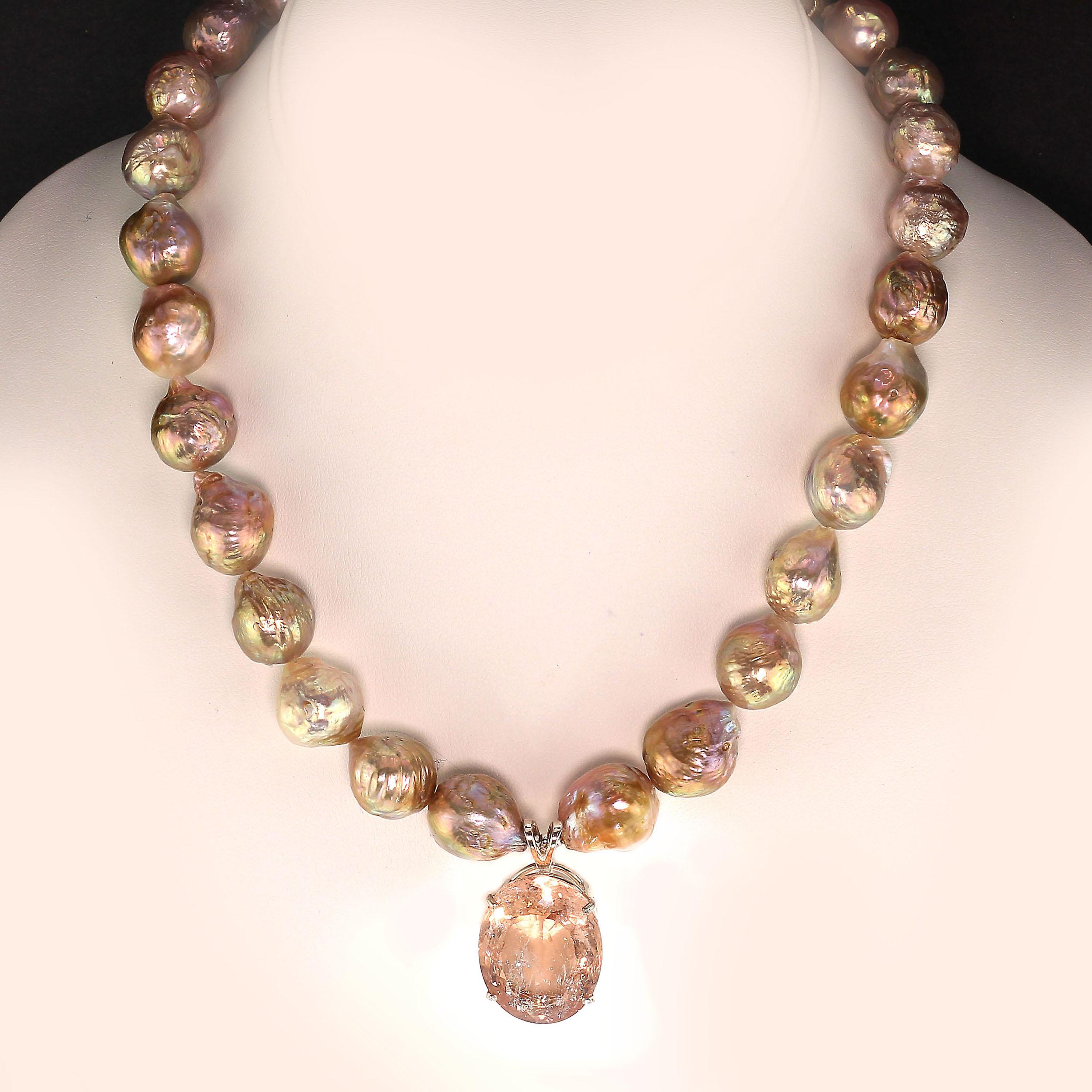 Keep Calm and Wear Pearls

Custom made, sparkling, 32.99 Carat, Peach Oval Morganite in Sterling Silver Pendant on gorgeous pearl necklace. This lively morganite is made more so with all the delightful inclusions natural to beryls. The generous