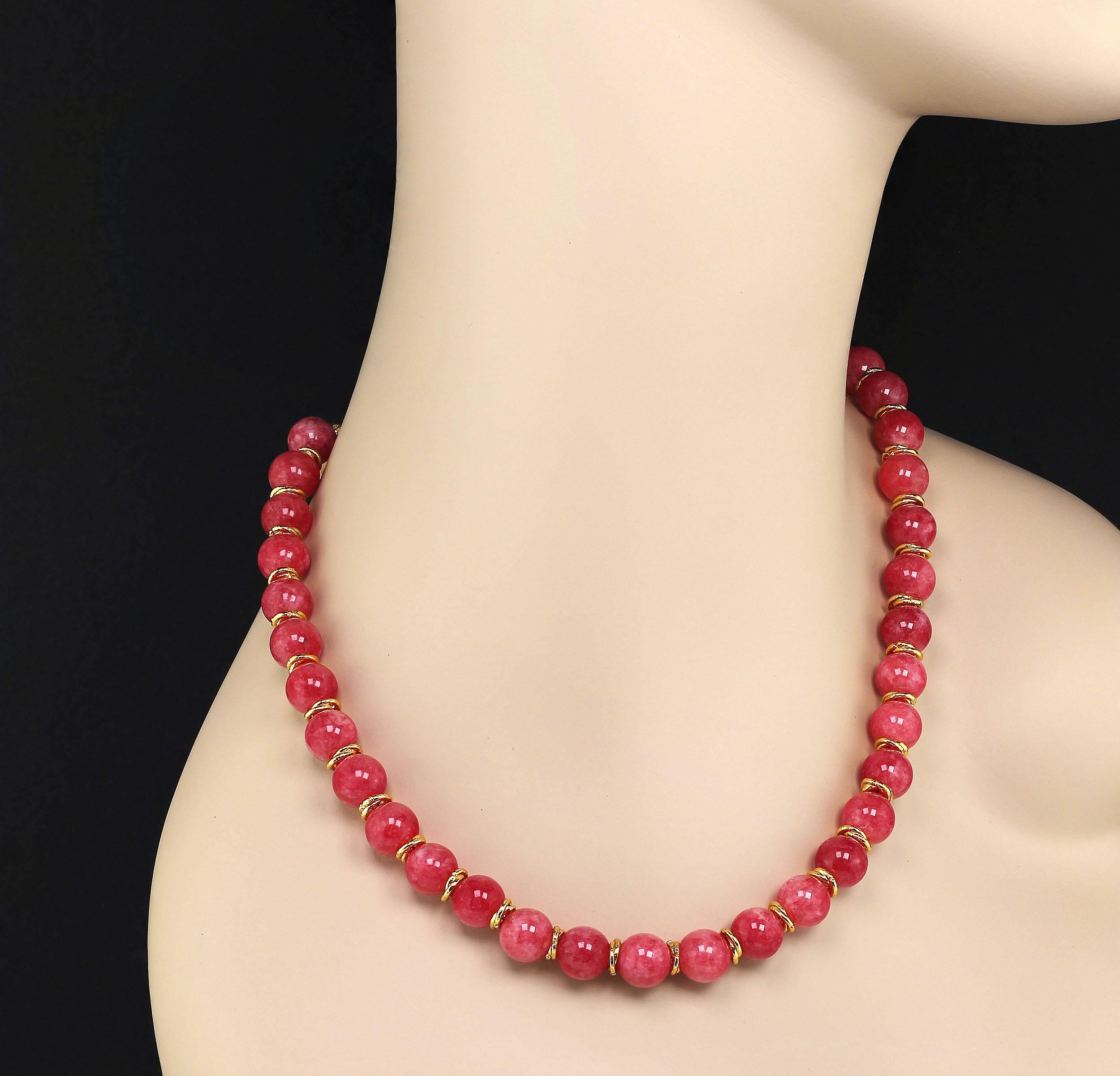 Custom made 20 inch Rhodochrosite tone necklace with goldy accents. This lovely peachy-pinky necklace is perfect to accent your Summer ensembles. The goldy accents are double rings secured off center. This original  necklace is secured with a pewter