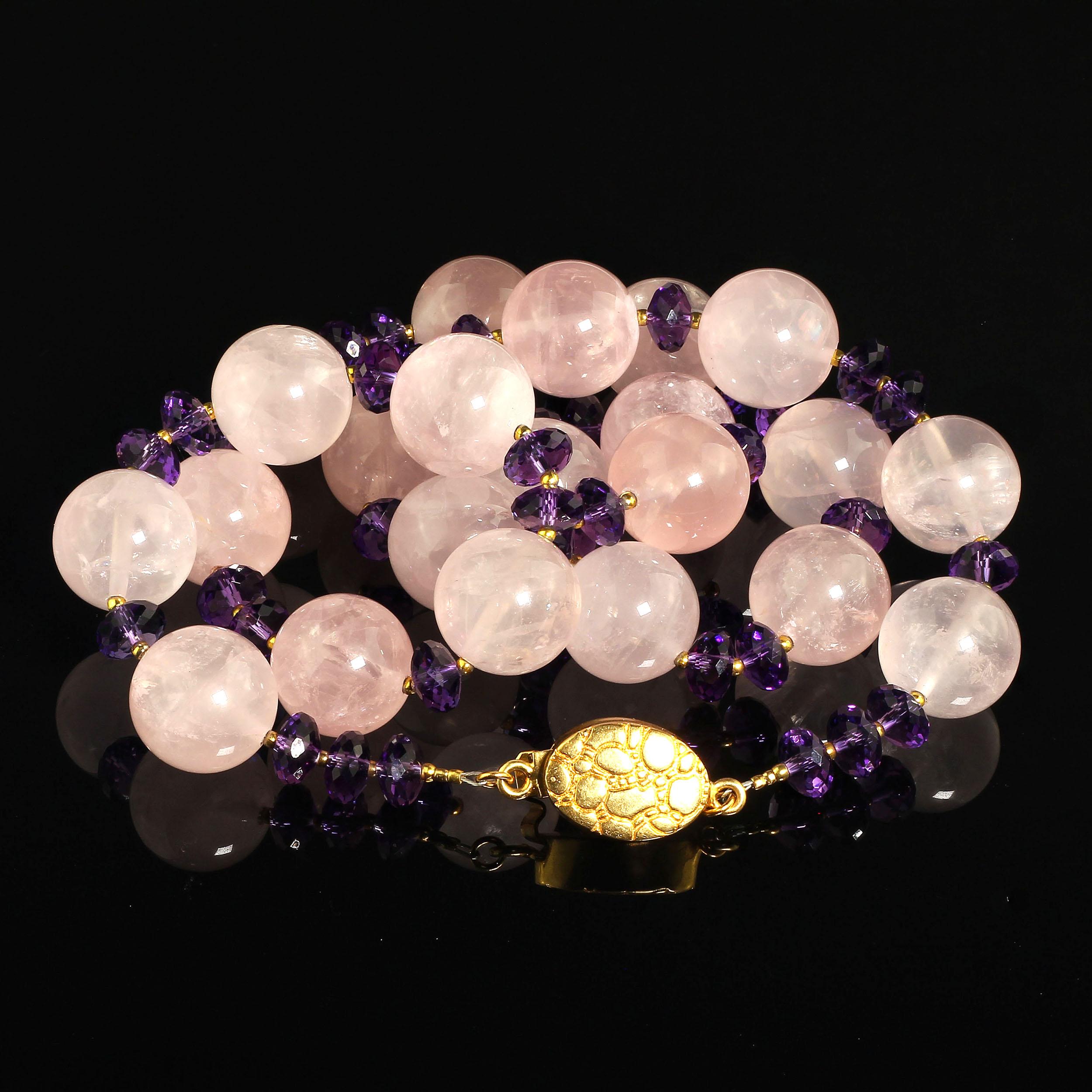 Sparkling Amethyst rondelles and glowing translucent Rose Quartz make this necklace a stunning addition to any wardrobe. The 25 inch length is very versatile and the gold tone accents and pebbled box clasp enhance the combination of Rose Quartz and