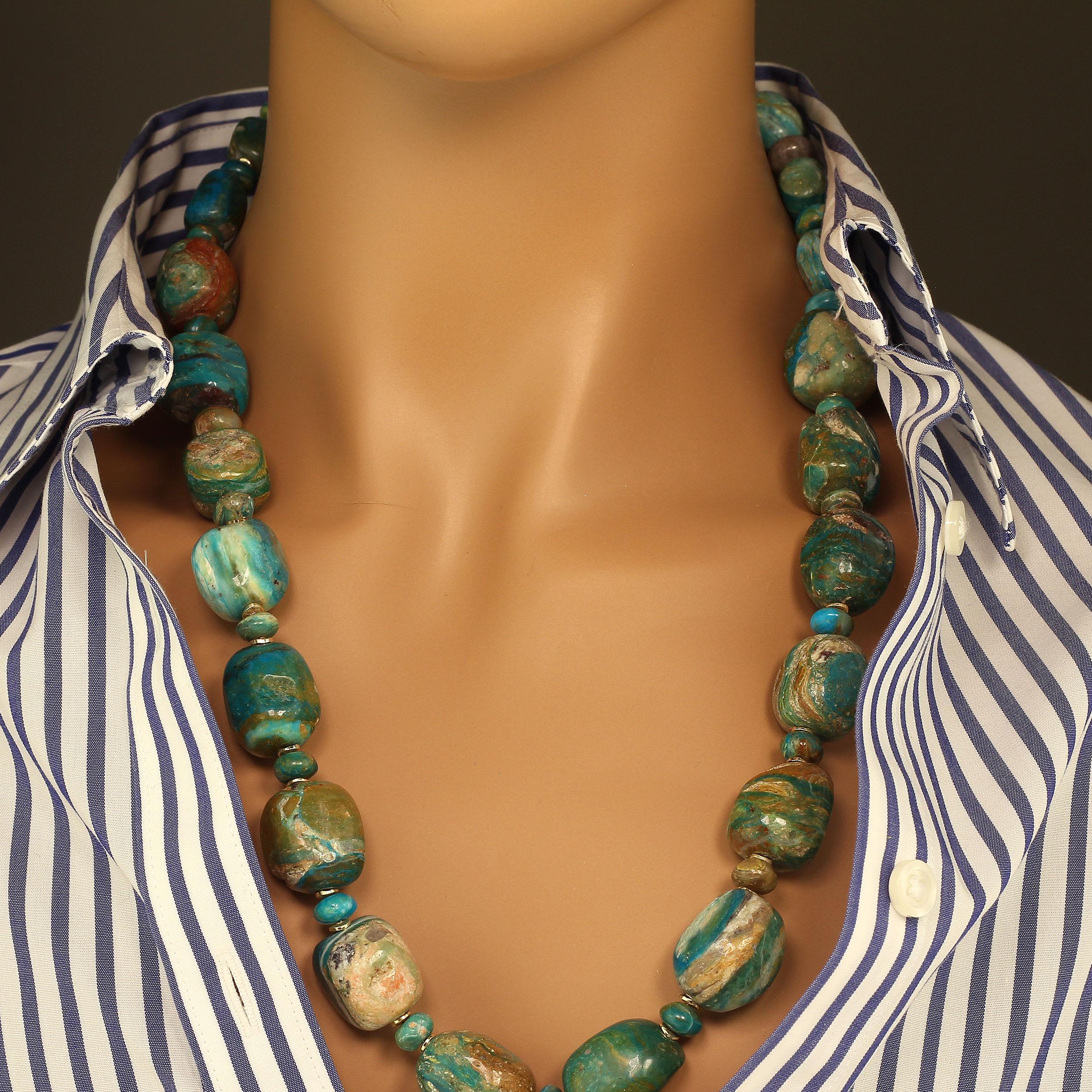 Fun and Funky highly polished blue and tan Peruvian Opal rustic necklace.  These graduated beads, 13-22 MM, are each unique in color gradation and shape.  Some are more rounded, some more squared off.  The small rondelles between the cubes are less