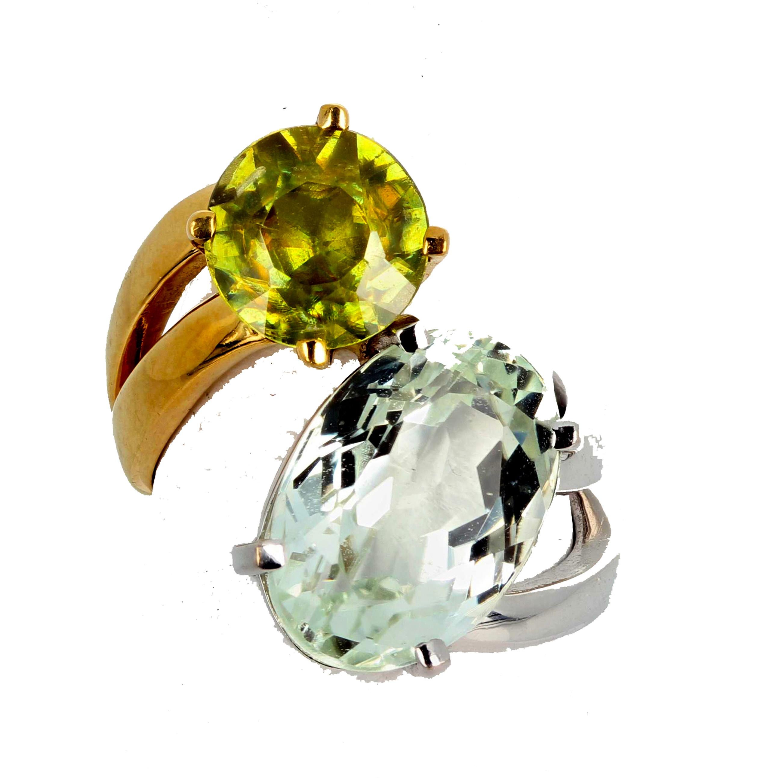 Rare unique glittering brilliant natural Amblygonite (14 mm x 9.8 mm) complemented by a gorgeous glittering green natural round Sphene (8.5 mm) set in an 18KT white gold and 18KT yellow gold ring size 5.  This is sizable but if you requested us to
