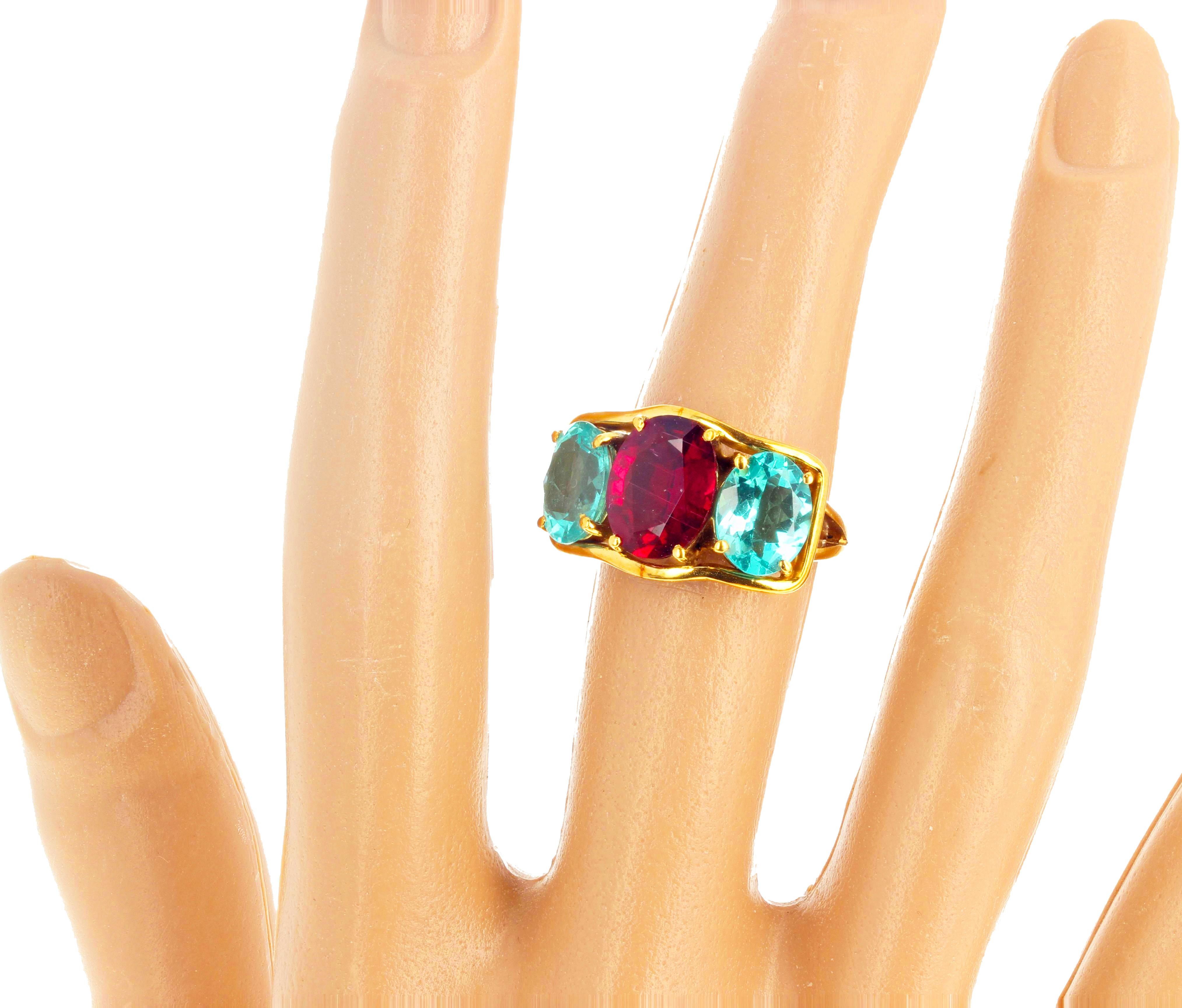 Beautiful classic 3 carat natural red Rubelite Tourmaline enhanced with a 1.89 Carat natural Apatite on each side set in this lovely 18Kt yellow gold ring size 7 (sizable for free).  The Sweat Heart ring will forever be cherished by the one you give