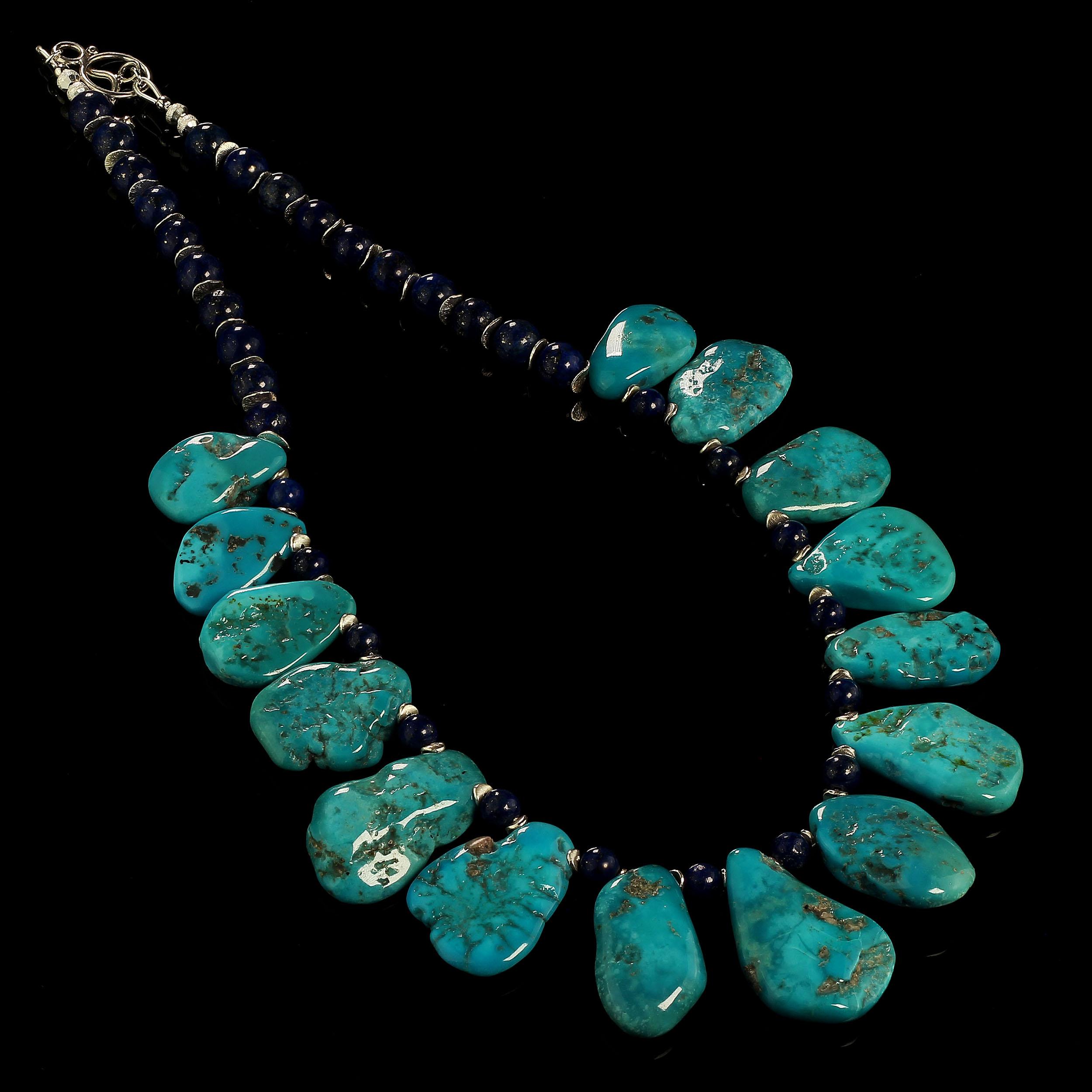 Spectacular necklace of Sleeping Beauty Turquoise tablets accented with Lapis Lazuli.  These gorgeous tablets glow with that unique world famous Sleeping Beauty look.  They range in size from 23 x 15 to 34 x 23 MM.  The Lapis Lazuli is 6 MM between