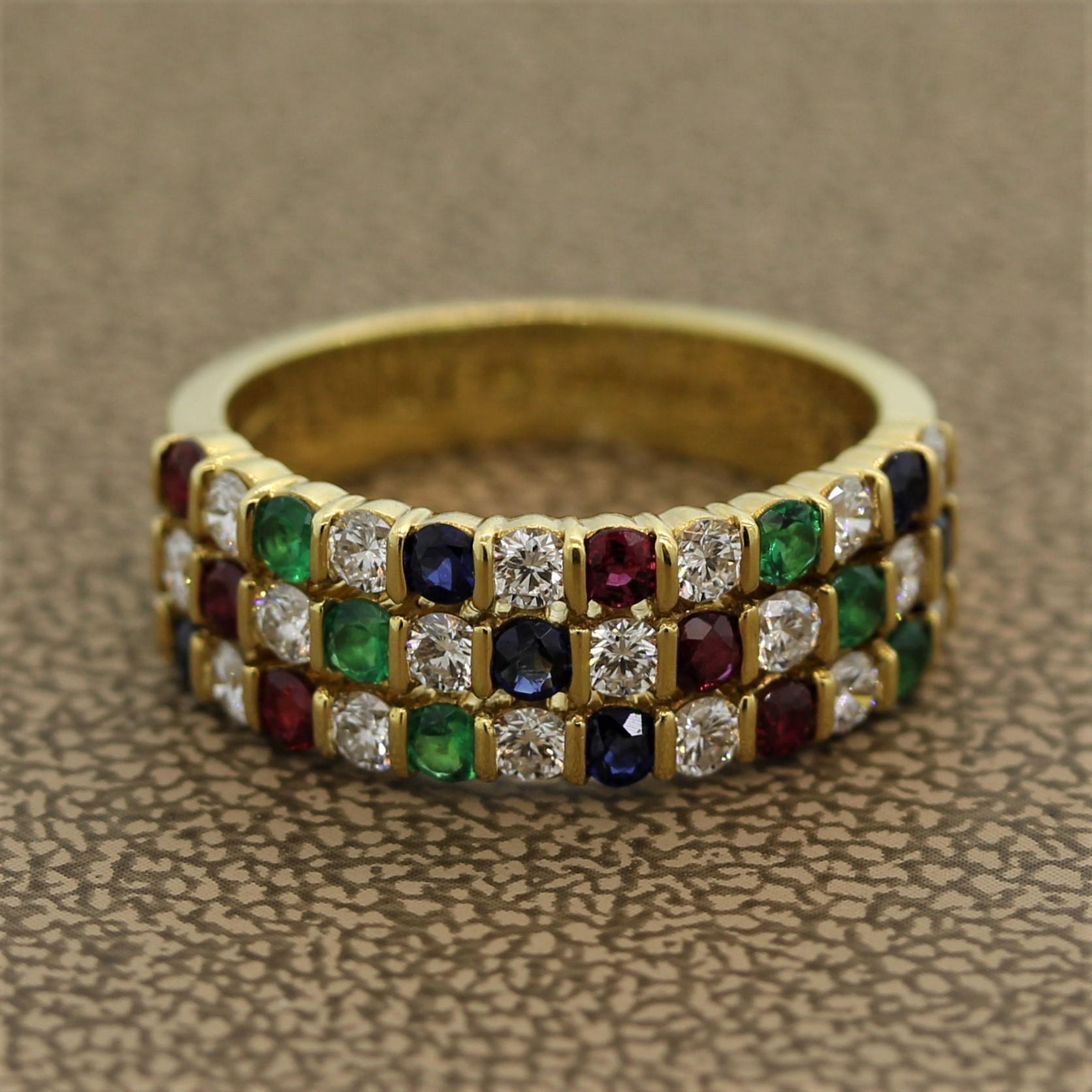 A sweet and colorfully designed ring by Gemlok. It features 1.00 carat of round brilliant cut diamonds along with 0.99 carats of emeralds, rubies, and sapphires which are all round cuts. Made in 18k yellow gold with extra fine stones.

Ring Size 6