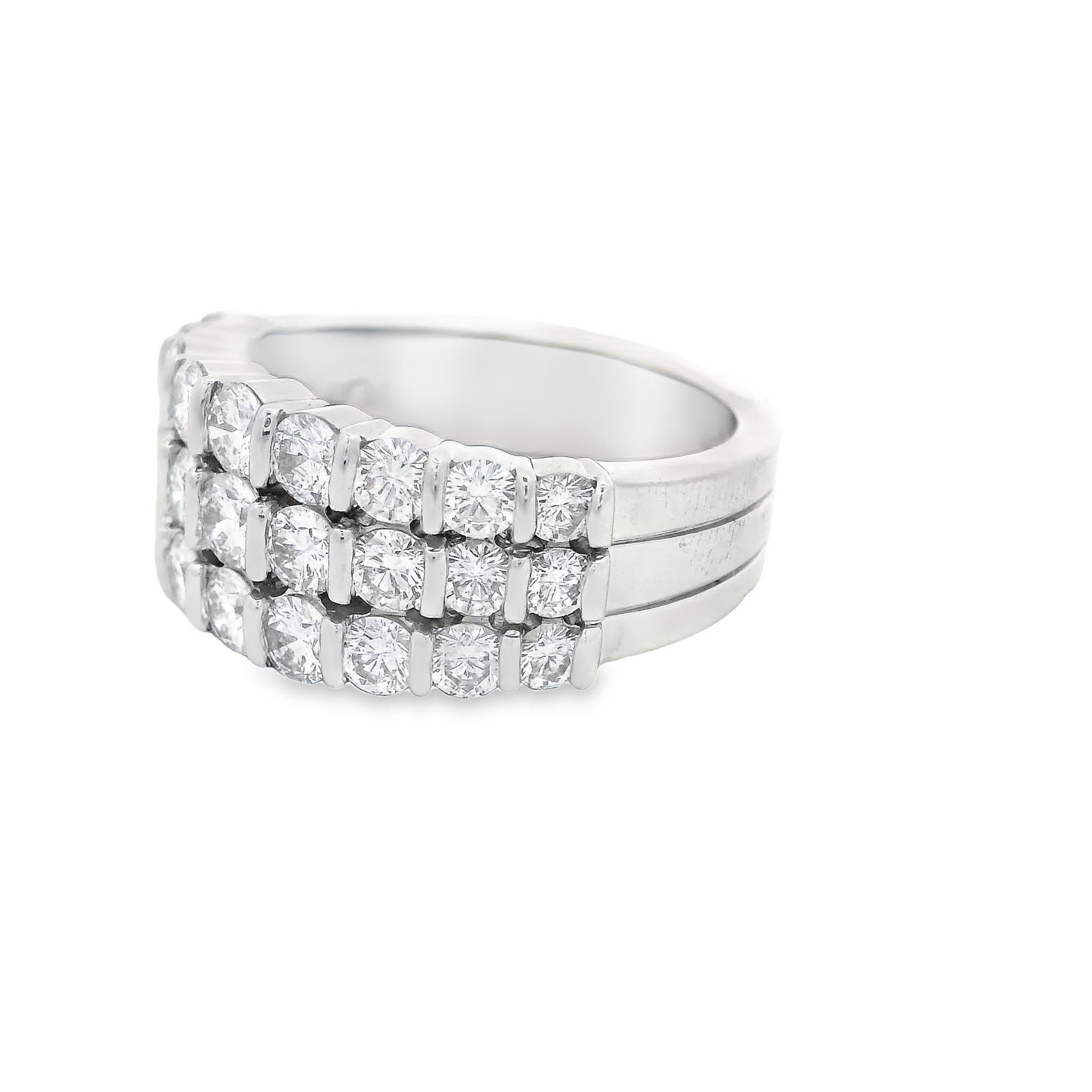 A lovely ring by designer Gemlok featuring 1.84 carats of round brilliant-cut diamonds. Threads of three rows of sparkling diamonds bring graceful minimalism and elegance to a shimmering ring crafted from platinum. There are a total of 27 diamonds