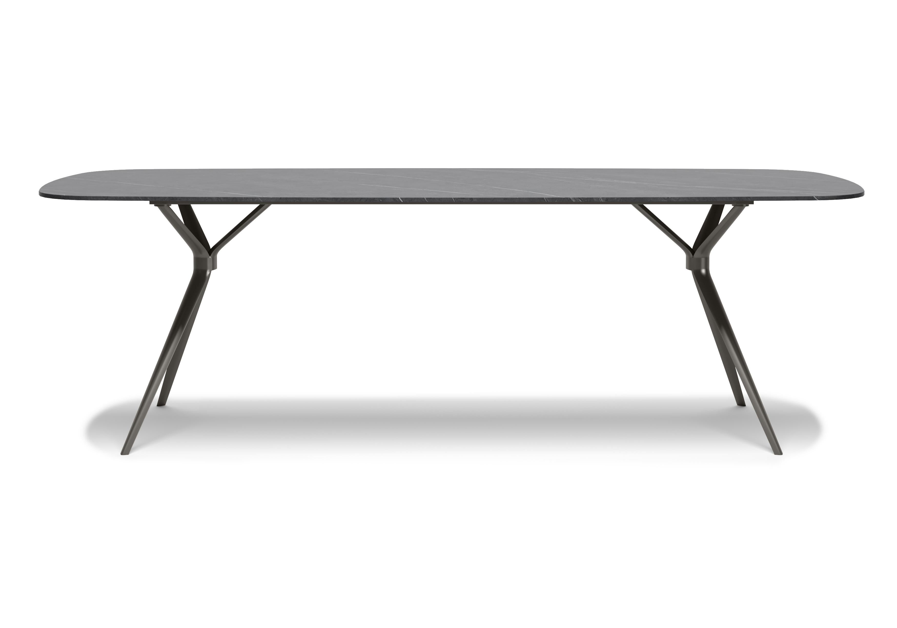 Gemma is a natural stone and aluminium garden table.‎
The Gemma Collection is a powerful sketch, synthesizes its rounded lines and comfort, it incorporates the power of contrast into the entire design and deepens the open space experience.‎ The