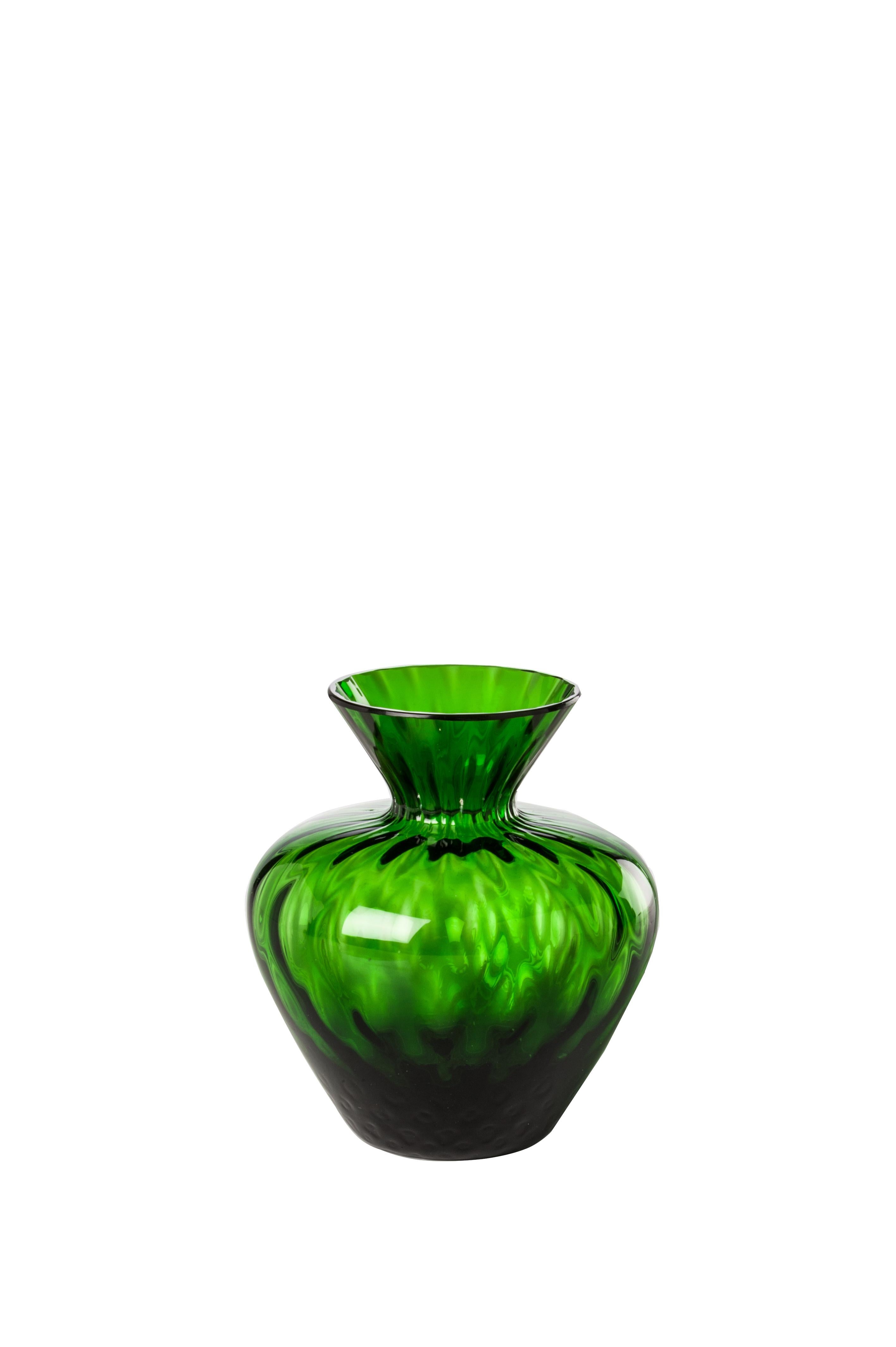 Venini glass vase with shaped body and neck in grass green designed in 2017. Perfect for indoor home decor as container or statement piece for any room. Also available in other colors on 1stdibs.

Dimensions: 9 cm diameter x 10 cm height.
