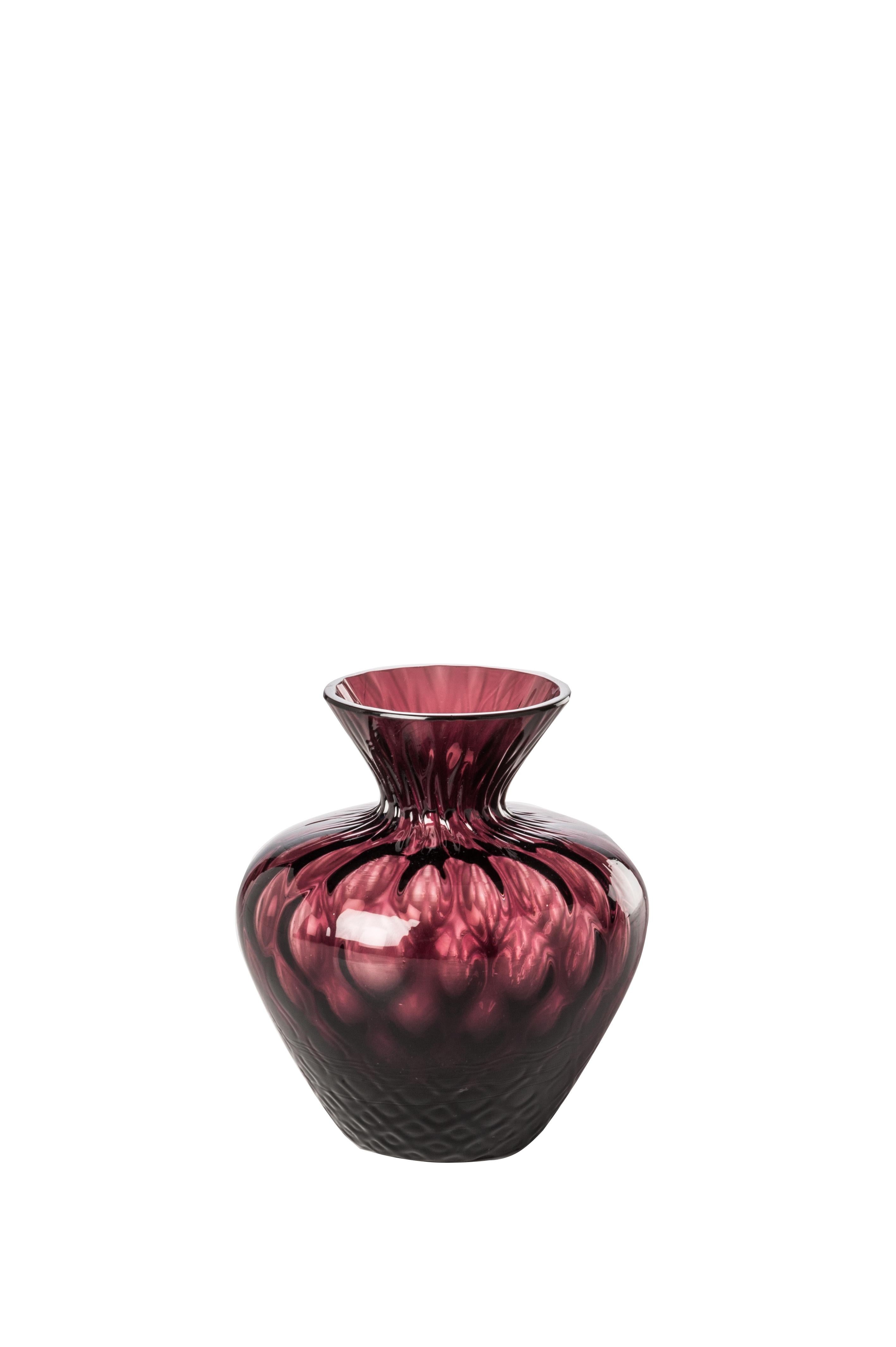 Venini glass vase with shaped body and neck in violet designed in 2017. Perfect for indoor home decor as container or statement piece for any room. Also available in other colors on 1stdibs.

Dimensions: 9 cm diameter x 10 cm height.