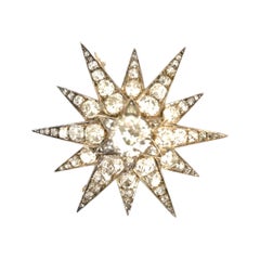 Gemolithos a Victorian Gold, Silver and Diamond Star Brooch/Pendant