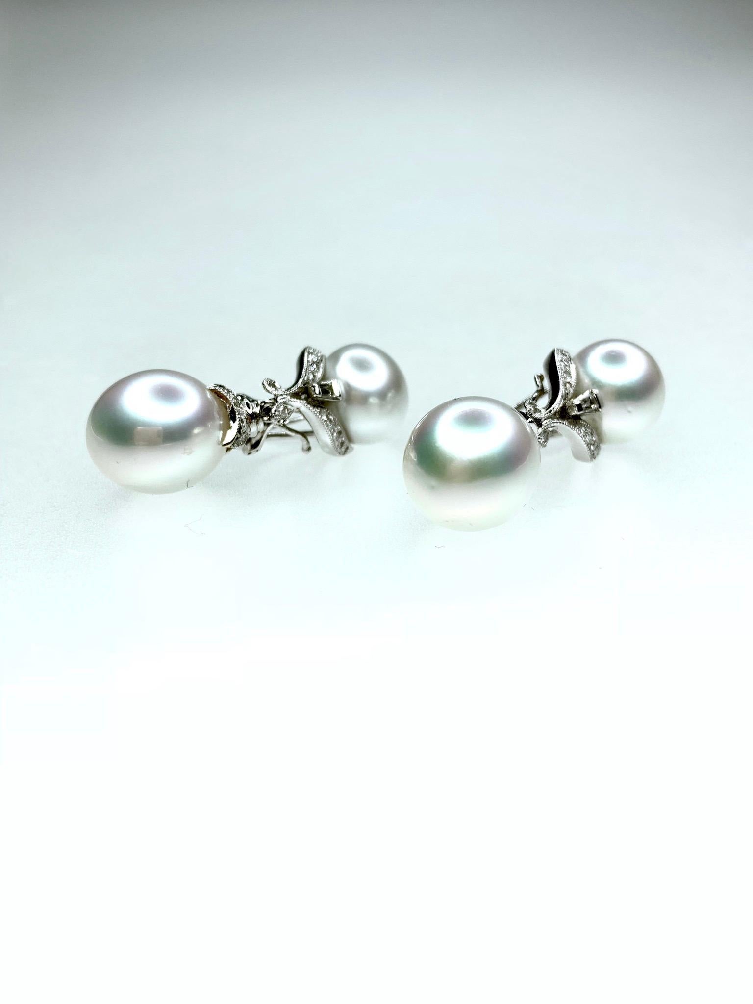 A Pair of Button and Pear Shaped Australian Cultured Pearl & Diamond Earrings. Drops detachable. 