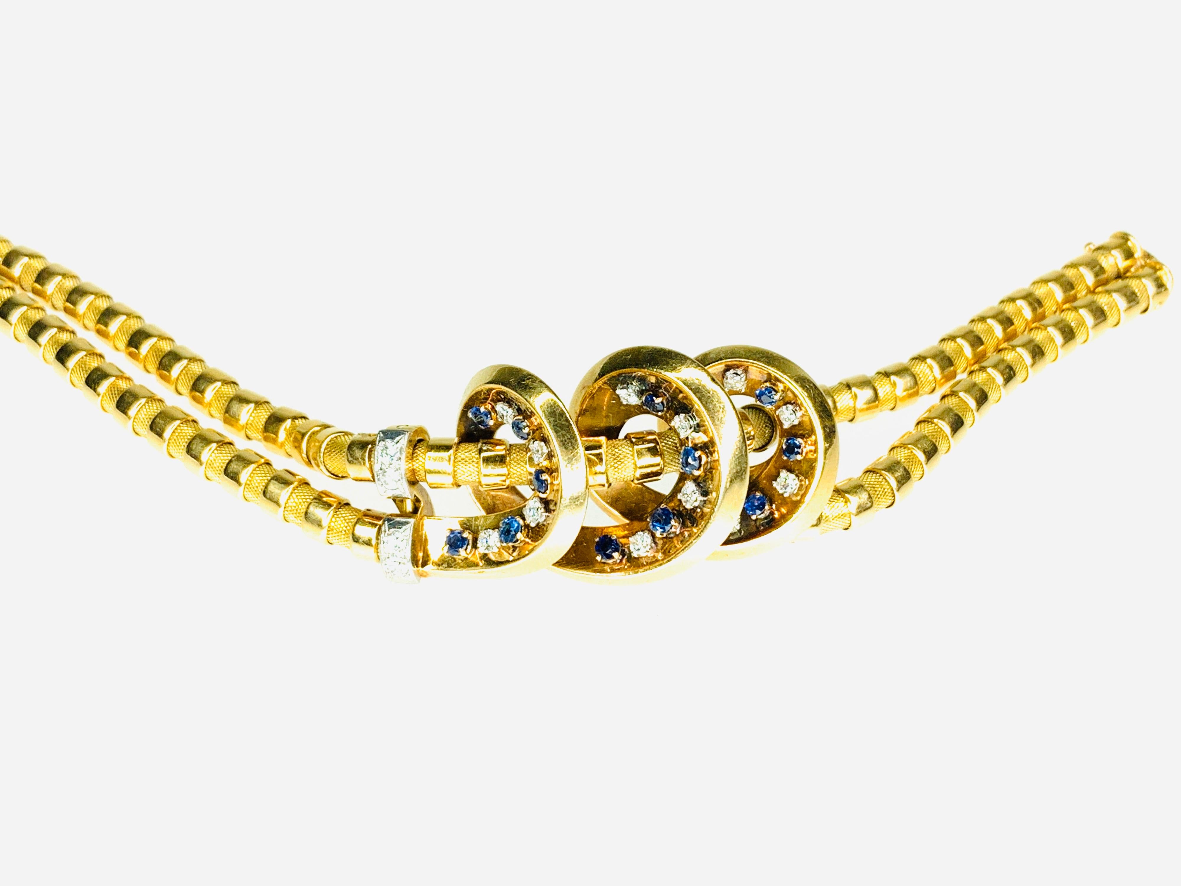 Gemolithos, Retro-Armband mit Saphiren und Diamanten, von LaCloche Fres, 1940er Jahre. Gold 18K ilustriert auf dem Buch 