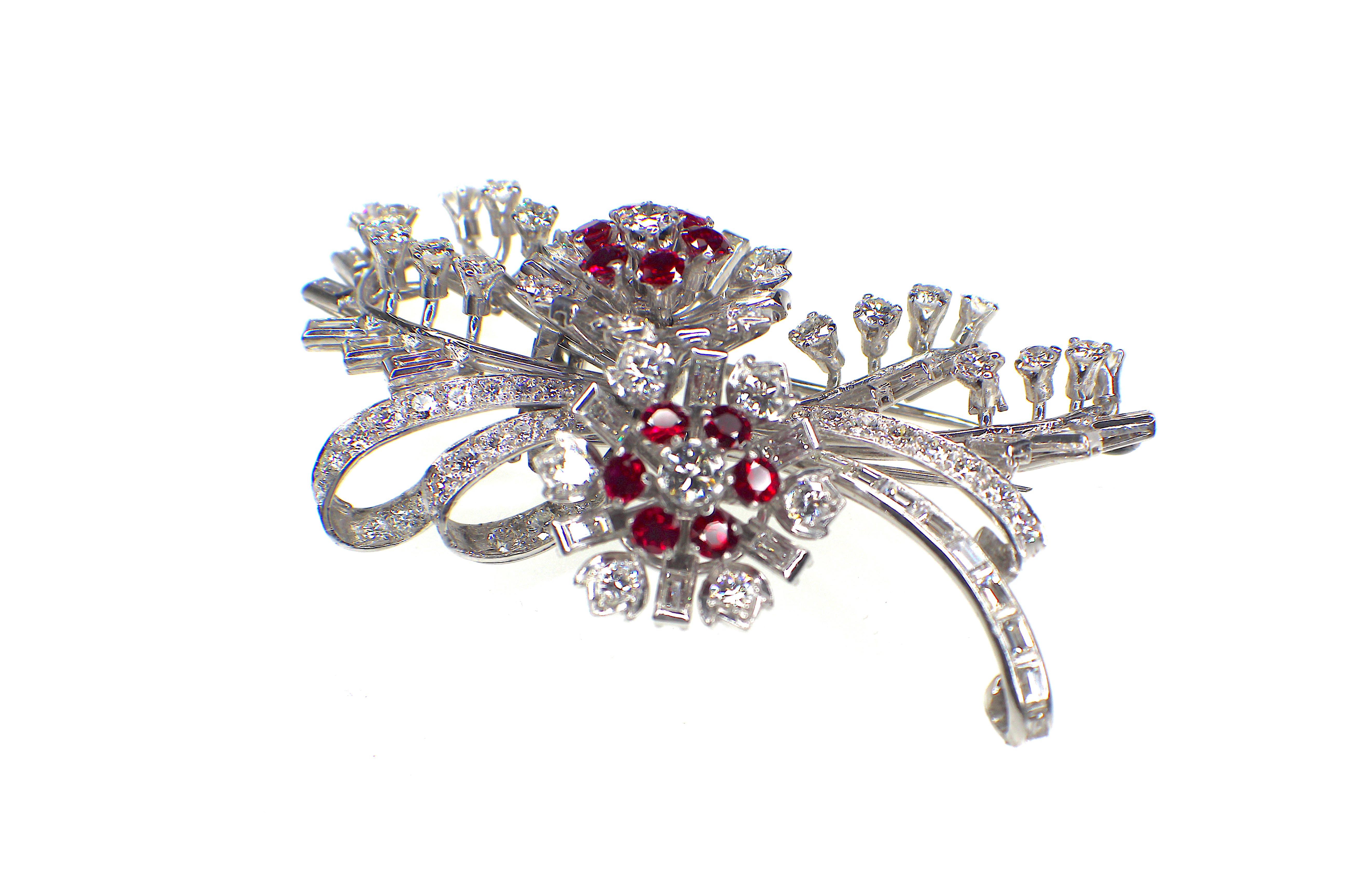 GEMOLITHOS Ruby and diamond brooch,  the rubies afre of very strong saturation and  red color and Burmese Origin, mounted in platinum, circa 1960´s