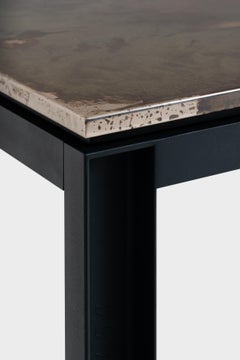 Tavolo da pranzo Gemona in ferro brunito e acciaio inossidabile di A. del Vecchio