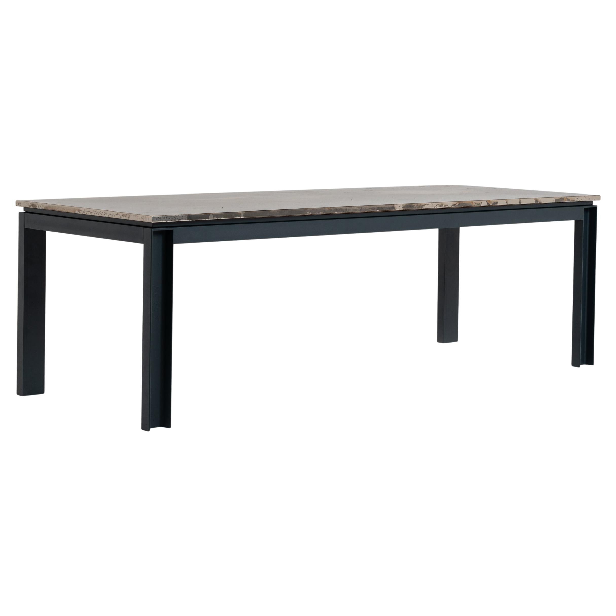 Gemona dining table in burnished iron and stainless steel by Stefano Del Vecchio
