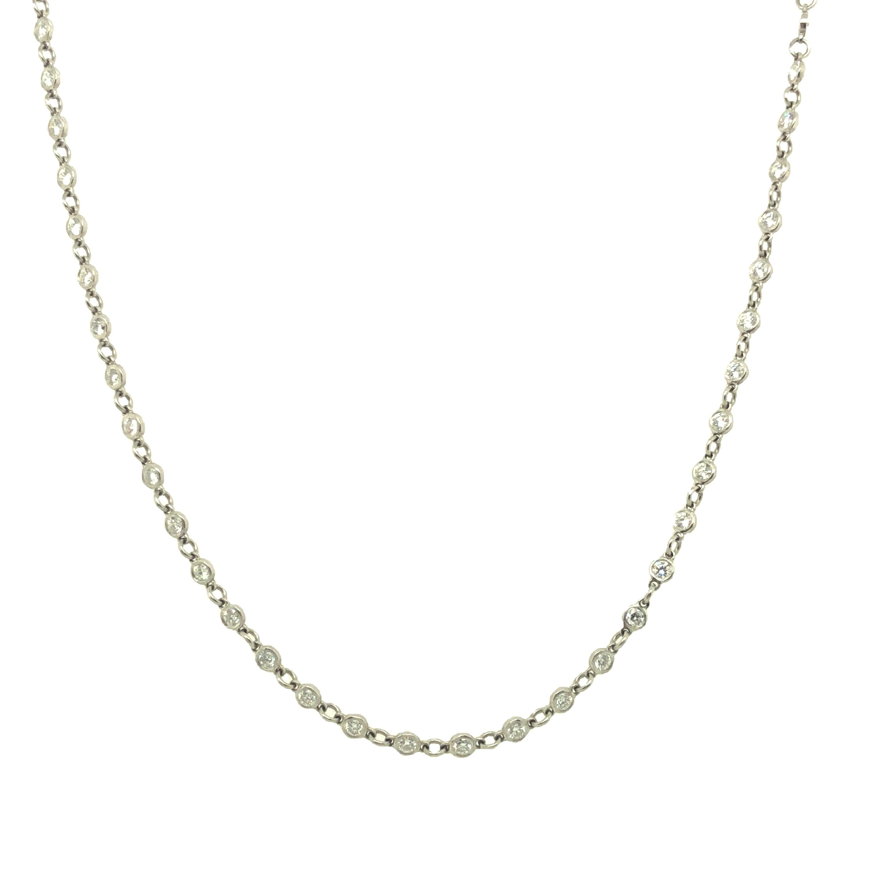 Bezel set diamond link necklace features 72 round brilliant cut diamonds, total weight of 2.24 carats, F-G VS quality.  It is handcrafted in platinum. The chain has smooth movement and will beautifully drape on your neck. It measures 16 inches long.