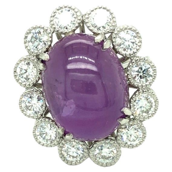Les pierres précieuses sont éternelles certifiées par le GIA : saphir étoilé rose violet 16,33 et diamants en vente