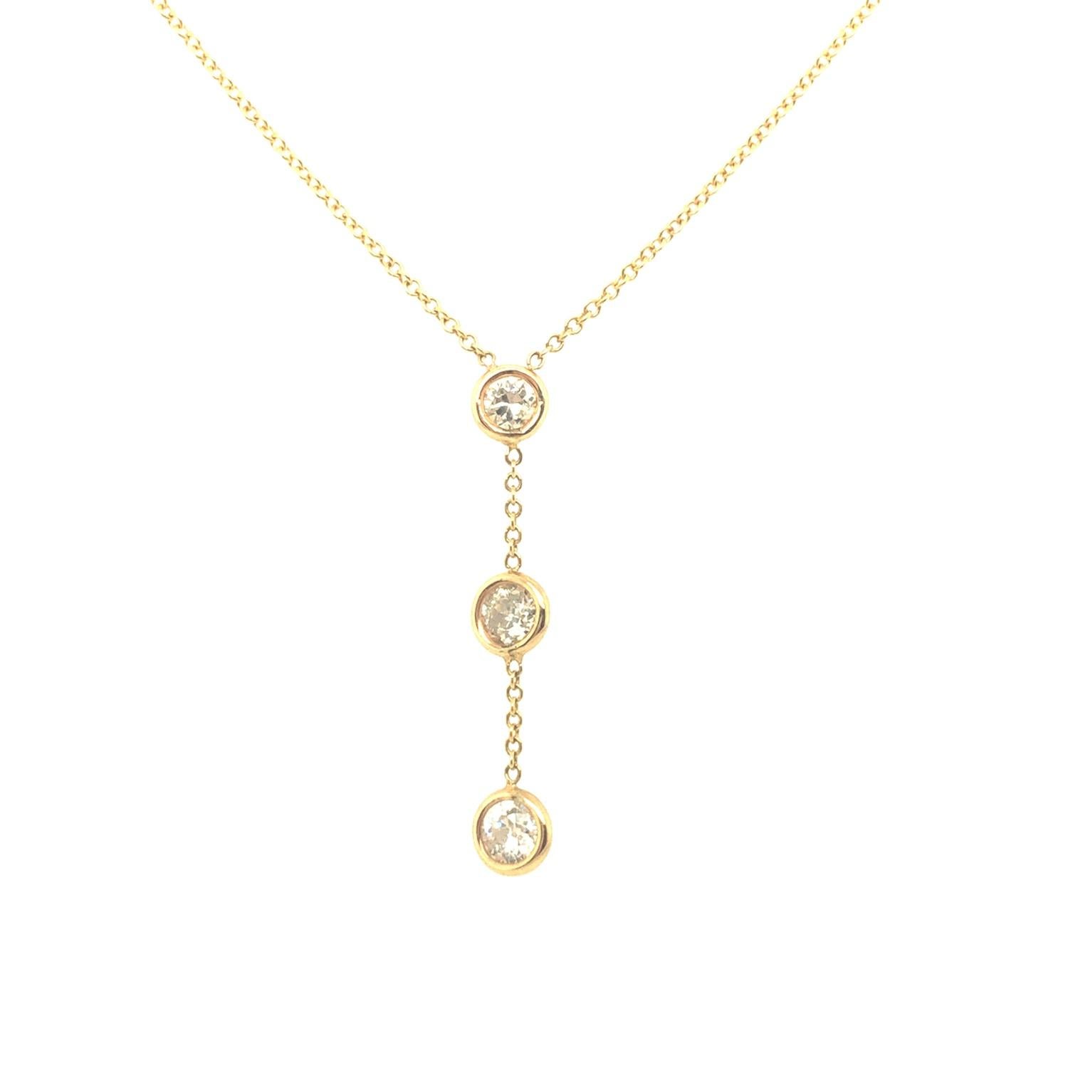Contemporary Gems Are Forever Three-Stone Dangling Diamond Necklace 14K Yellow Gold For Sale