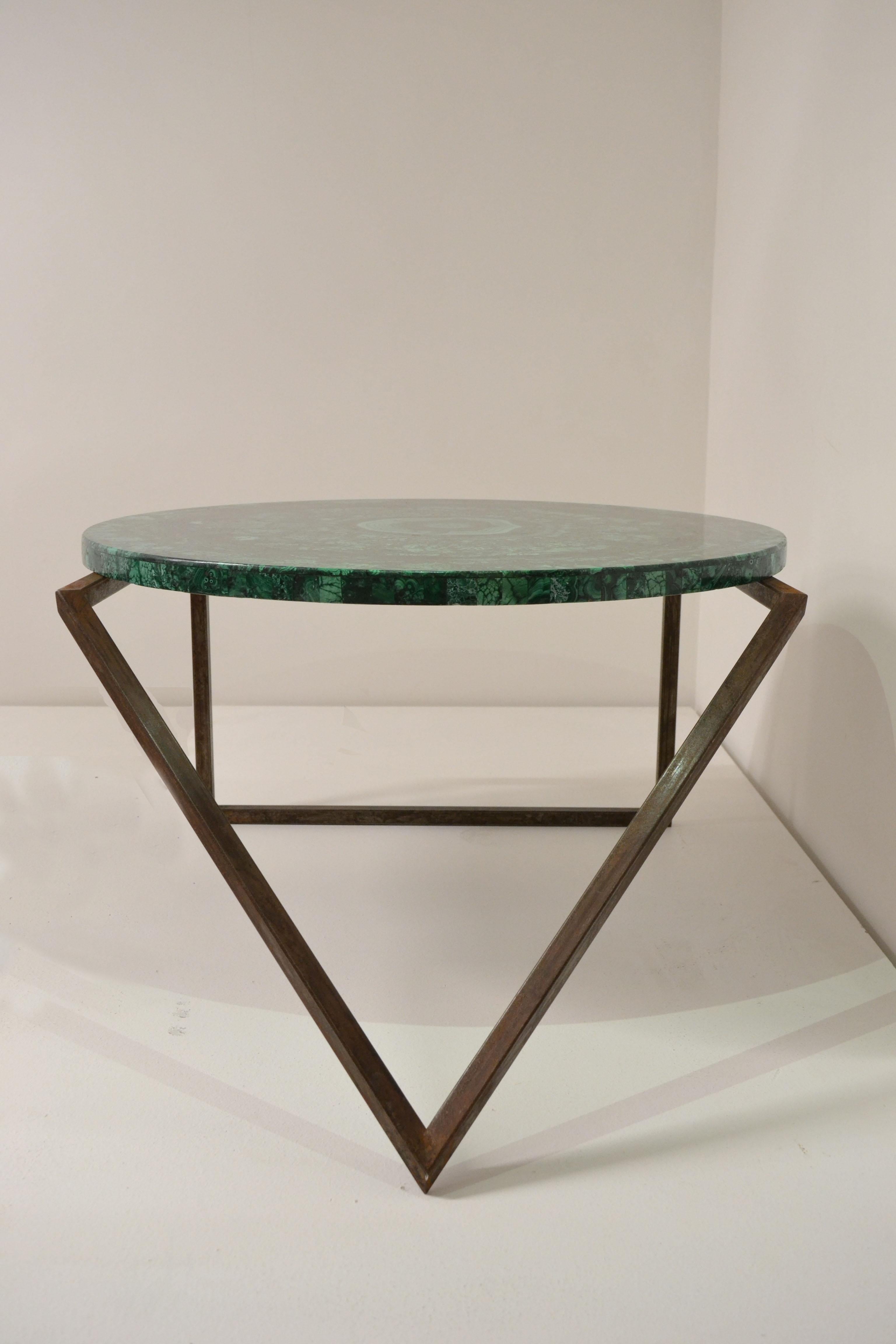 'Gems in the Air' is an refreshing piece in every regard. 

From the beautiful Malachite top piece - natural art in its own right - to the amazingly sculptural legs, 'Gems in the Air' is an all-round masterpiece of design that evokes a striking