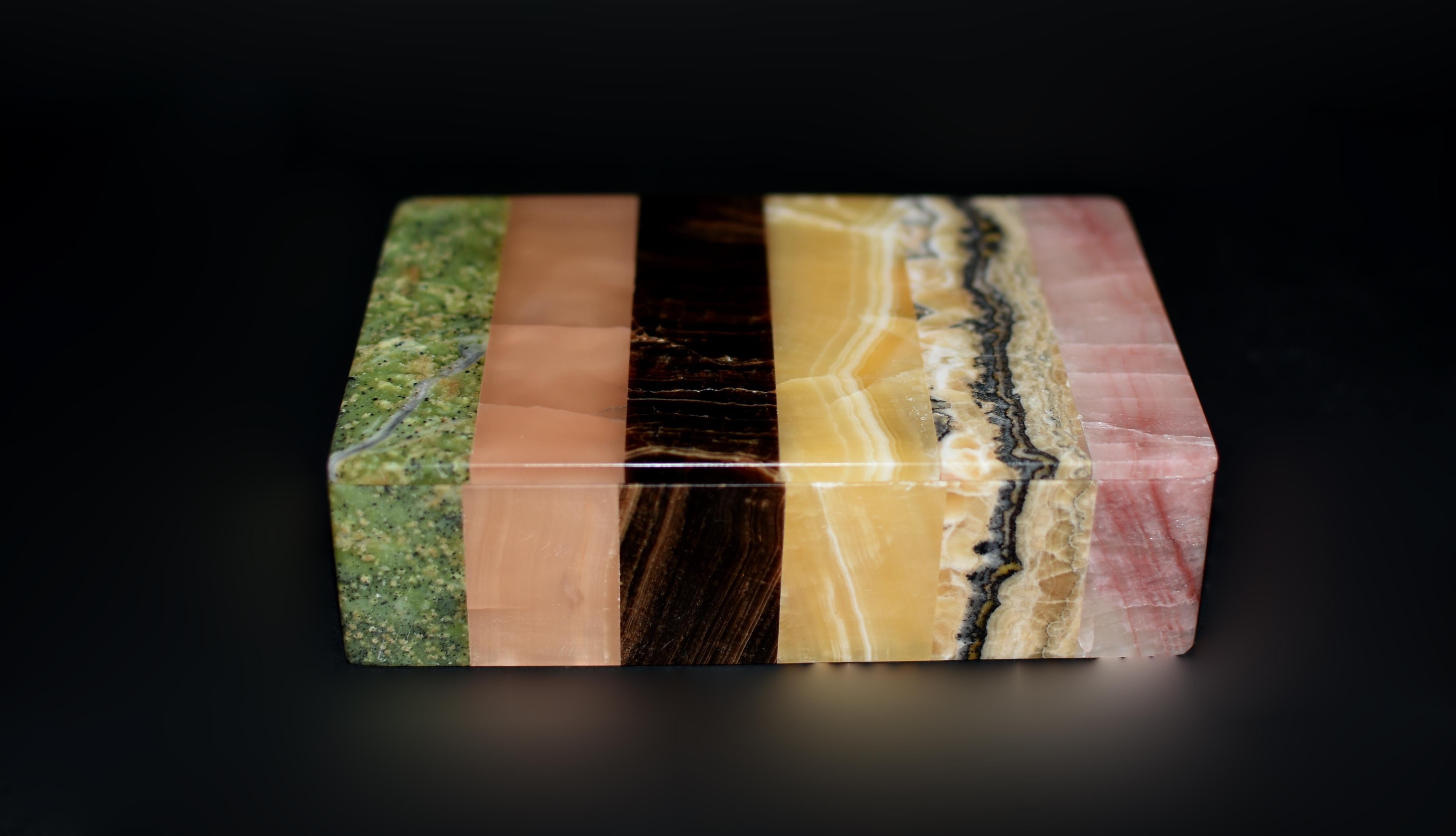 A beautiful 1.85-lb, pure gemstone box crafted from six natural stones, showcasing the artistry of a master craftsman. A harmonious blend of green serpentine, chocolate obsidian, honey calcite onyx, pink rhodonite, and rose quartz each cut into