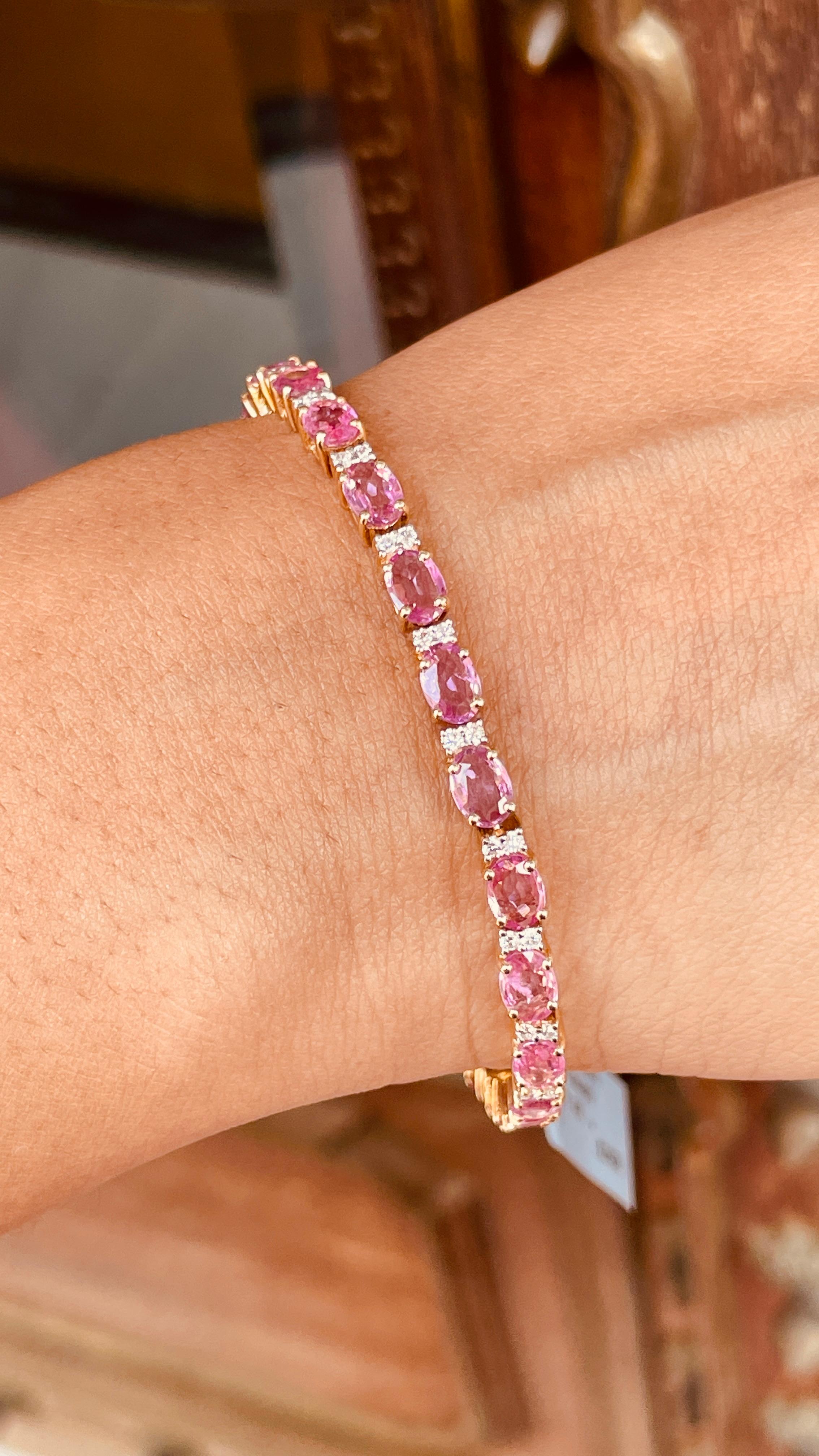 Women's Gemstone Bracelet Featuring Oval Cut Pink Sapphire in 14K Gold With Diamonds For Sale