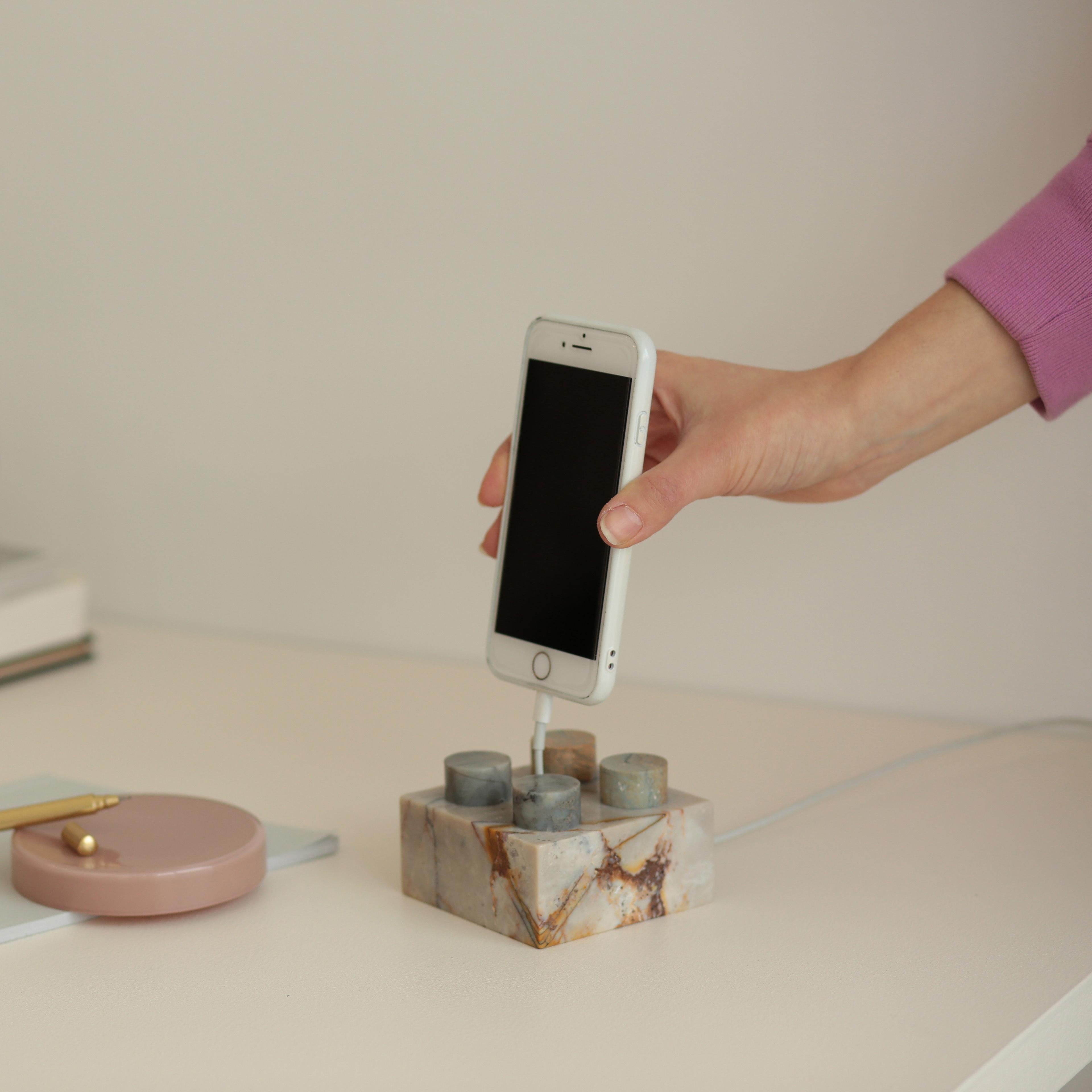Your desk, with soul: creamy soapstone phone base combining utility and organic style.

We’ve brought a playful classic to the desktop. As we perfect the video call, we've realized just what we wanted in a phone stand: a beautiful piece of Andean