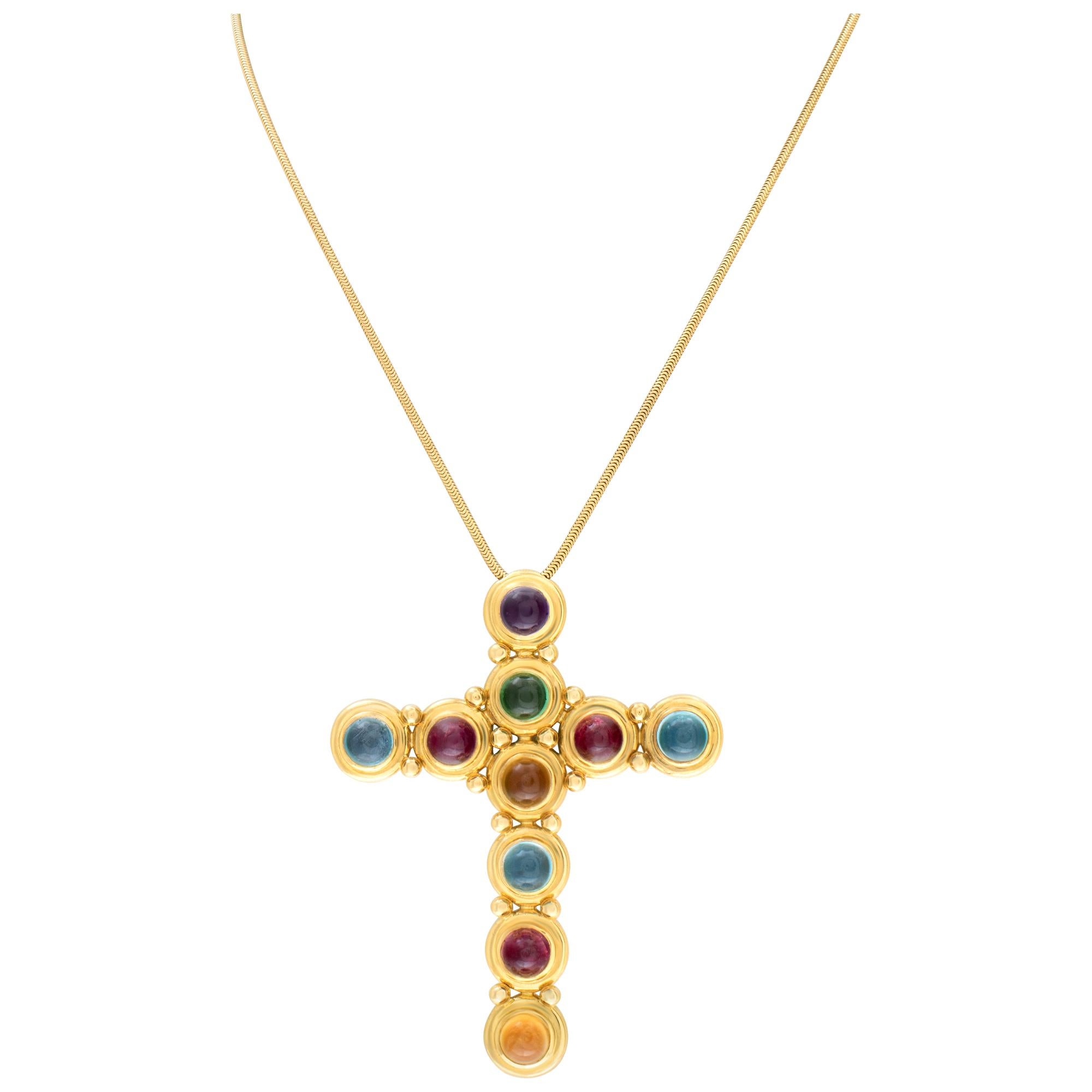 Tiffany & Co Paloma Picasso gemstone cross in 18k gold with aquamarine, blue topaz, amethyst, citrine & tourmalines. Cross is 78 mm long and 62 mm wide. Chain is 18
