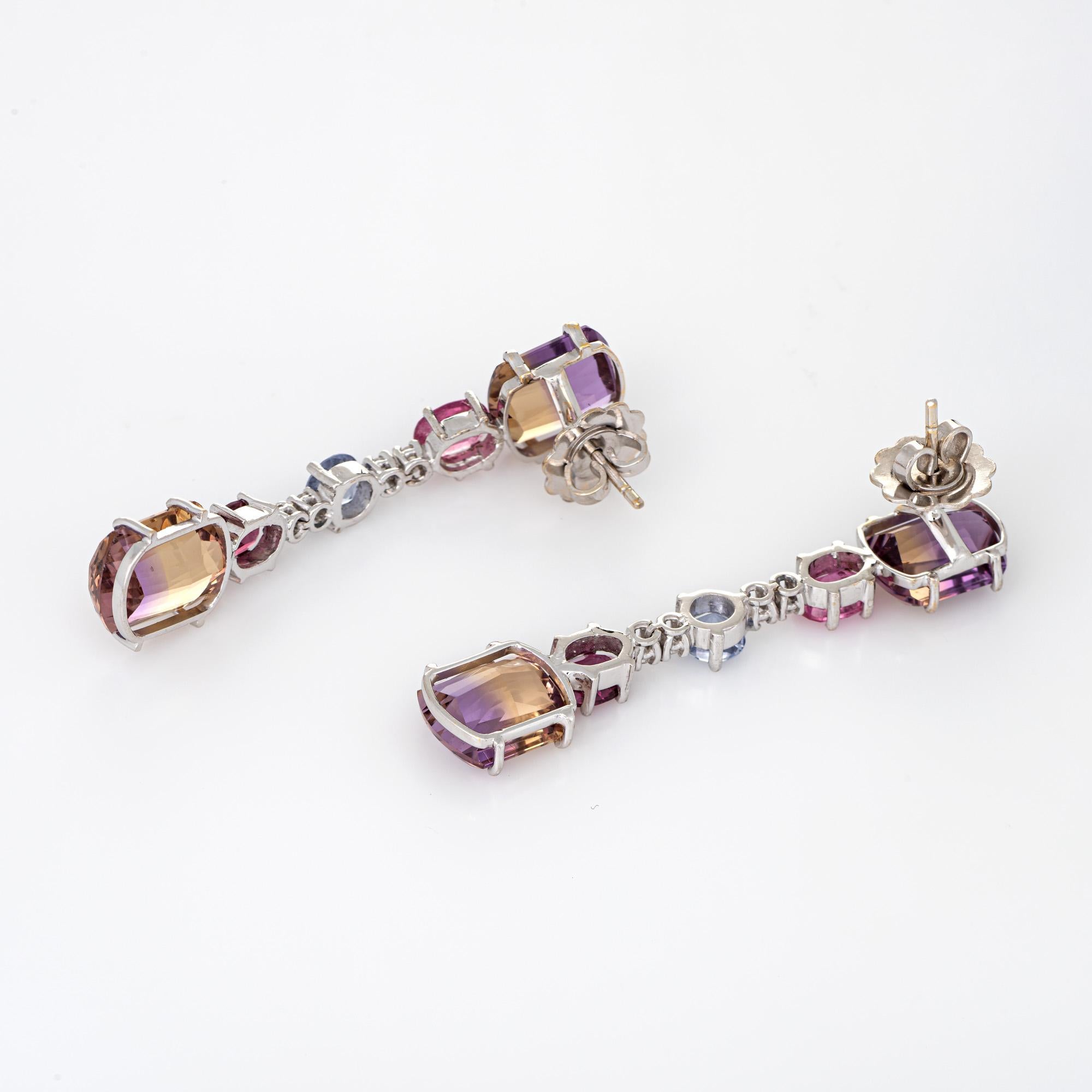 Elegant pair of multi gemstone drop earrings (ametrine, iolite, pink tourmaline and diamond) crafted in 18k white gold. 

Four ametrine measure 11mm x 9mm and total an estimated 20 carats (5 carats each). The pink tourmalines total an estimated 2