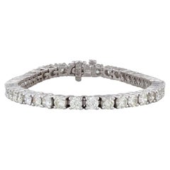 Gemstone Information: - Natural Diamonds - Total Carats - 8ctw Cut - Round Brill