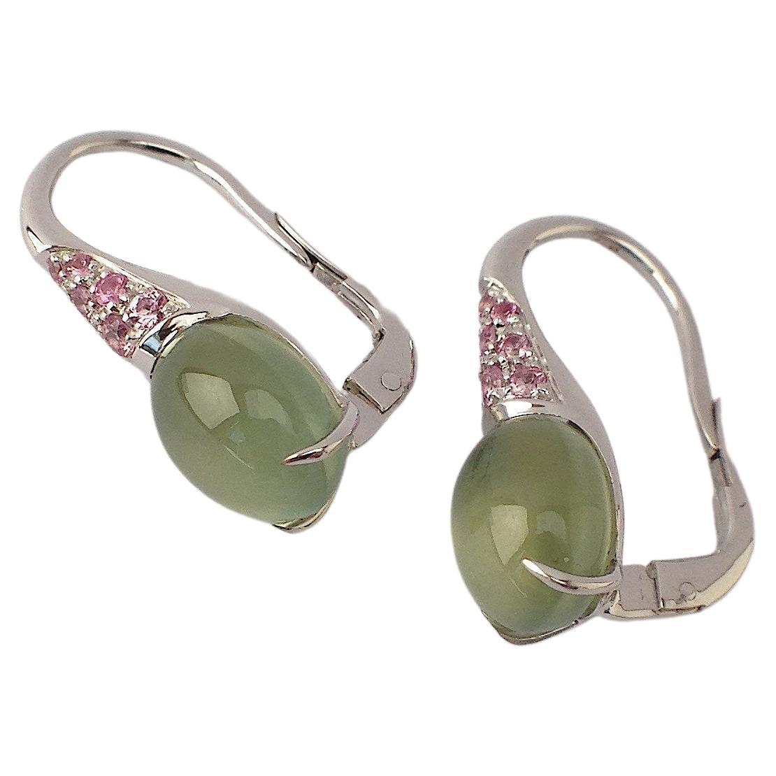 Gemstone Pink Sapphire Prehnite 18Kt Gold Earrings Made in Italy
These earrings have two prehnite cabochon cut 8x10 mm and ct 0.39 pink sapphires with lever spring clips in white gold. 
The cabochon are not standard cut, but they are more rounded