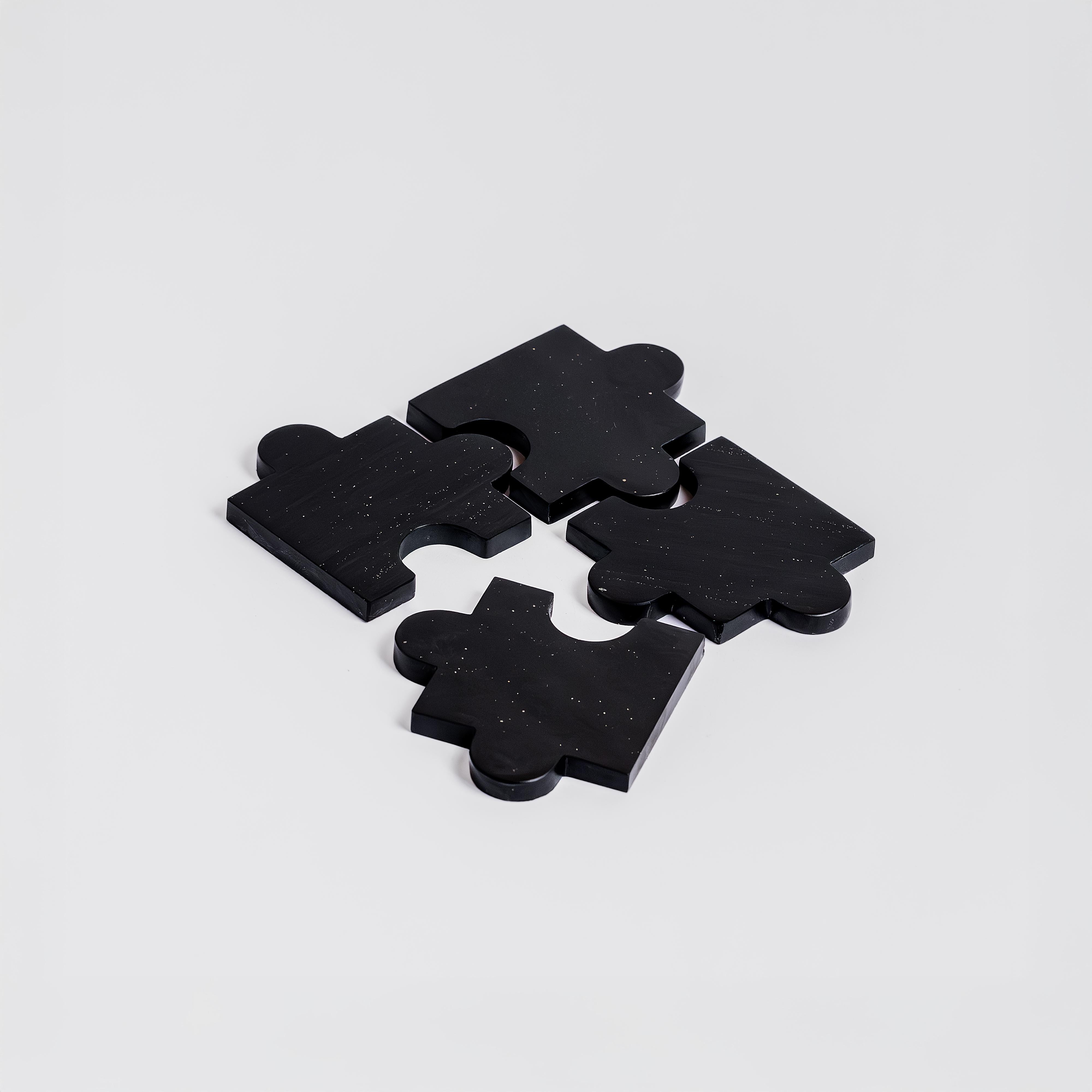 Elevate your home's elegance with these black onyx coasters, combining luxury and protection for your furniture.

Be the host with the most with these contemporary, eye-catching coasters. Handmade from onyx stone, these stylish coasters function as