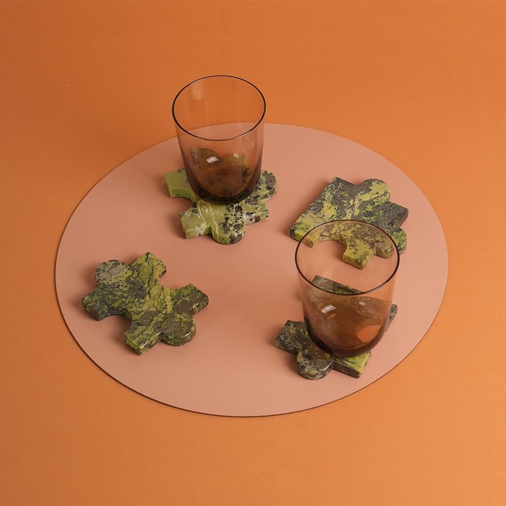 Handcrafted serpentine coasters protect your furniture with a natural, sophisticated touch.

The power of the Andes captured in special objects for home. The beauty of natural gemstones add a pop of playful decor, elevating classic shapes to be