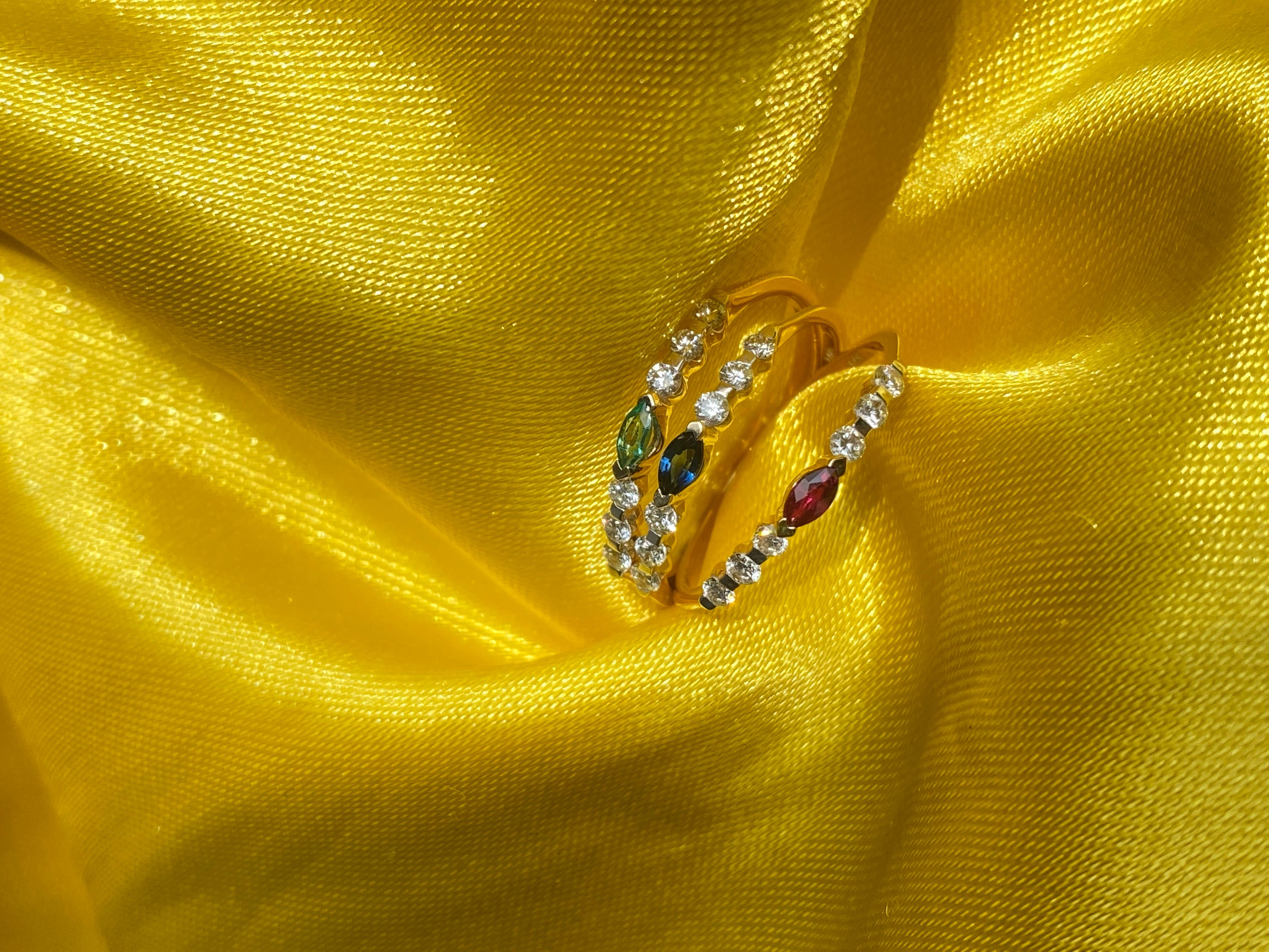 Marquise gemstones and diamonds set in 14k yellow gold! Gemstone center with diamond side stones, these rings are super dainty! They are petite, but strong! Small, but beautiful! They make a statement, but can be stacked! Ruby, Sapphire, and Emerald