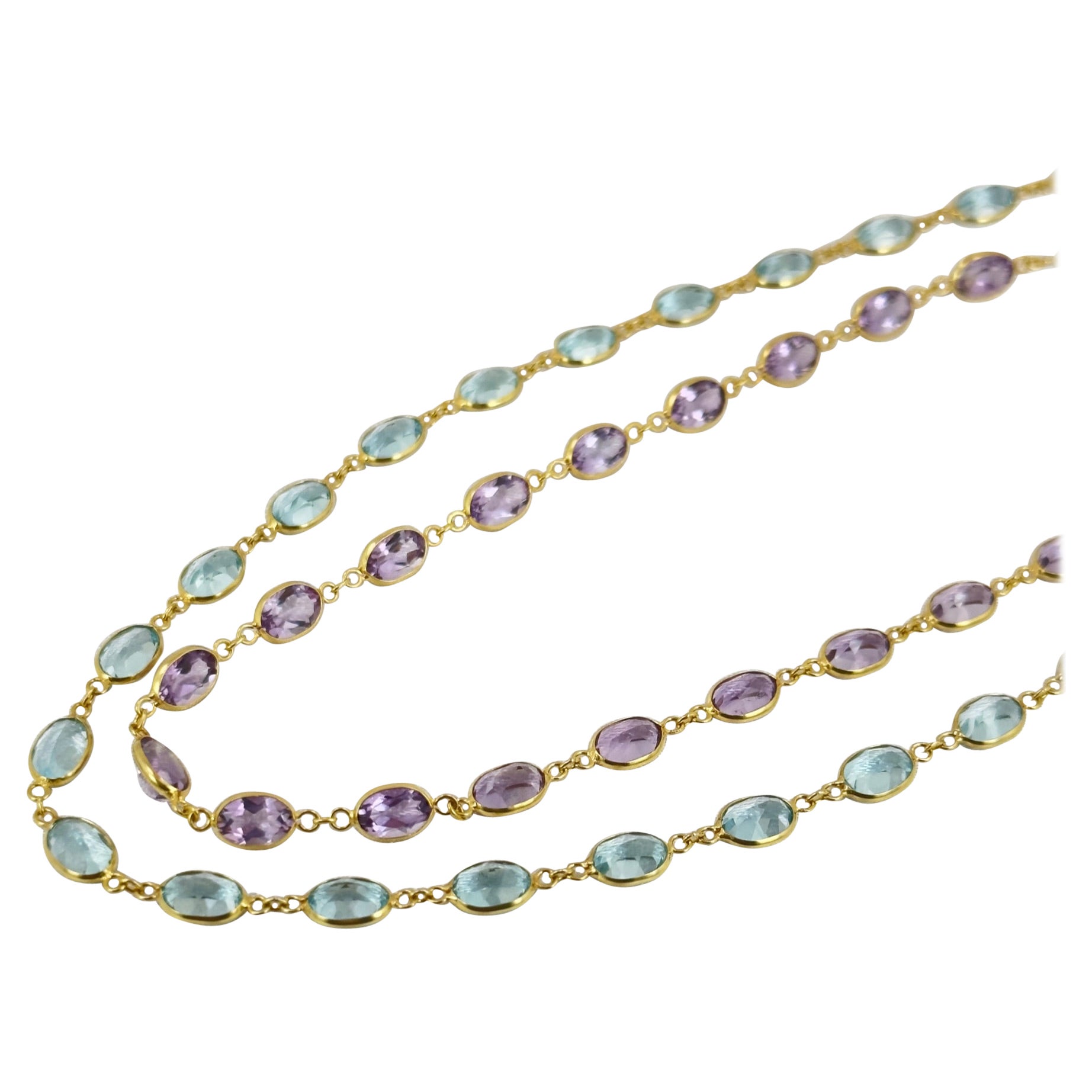 Ovale Edelstein-Tennis-Halskette

** Jeder Artikel wird einzeln verkauft **

Unsere brandneuen Amethyst- und Blautopas-Tennis-Ketten! In einer zierlichen Lünettenfassung gefasst, leuchtet die Farbe der Steine heller, weil das Licht von oben und