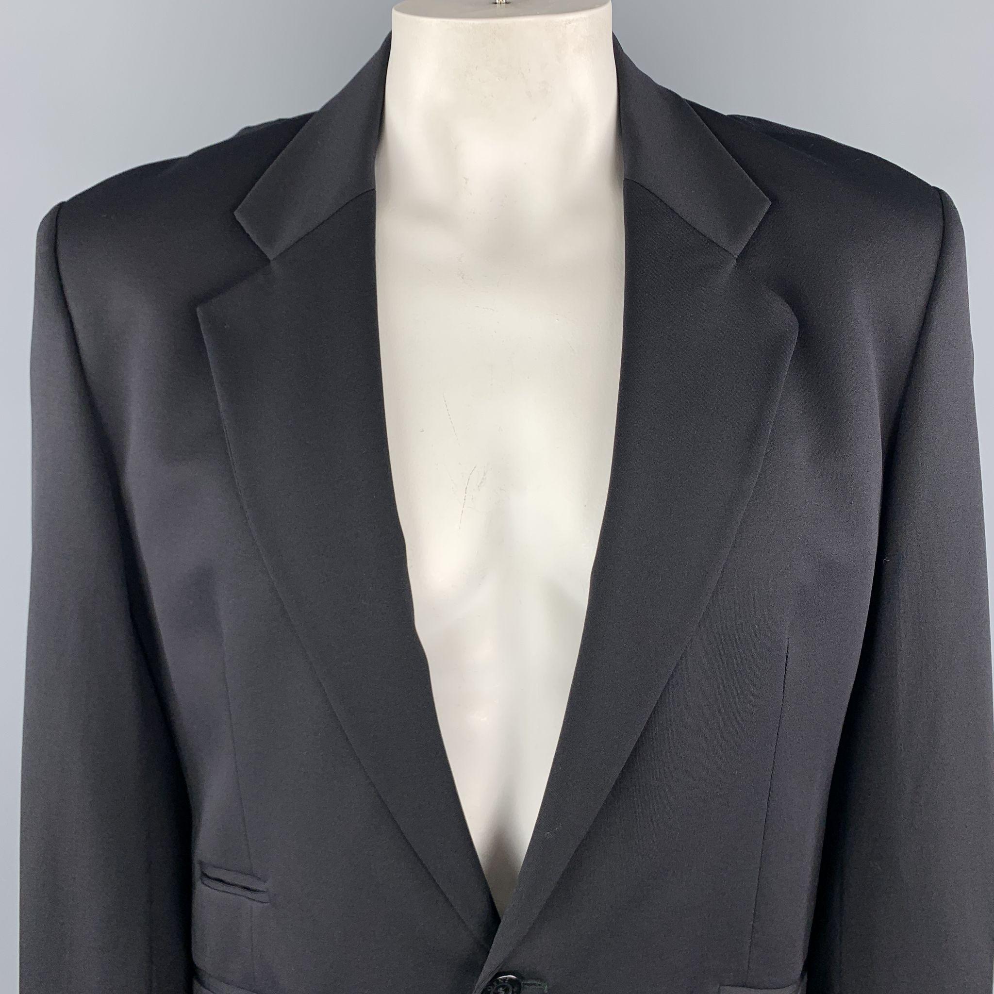GENE MEYER Sport Coat comes in a black nylon blend material, with a notch lapel, slit pockets, a single button at closure, single breasted, unbuttoned cuffs and a single vent at back. Made in Italy.

Excellent Pre-Owned Condition.
Marked: