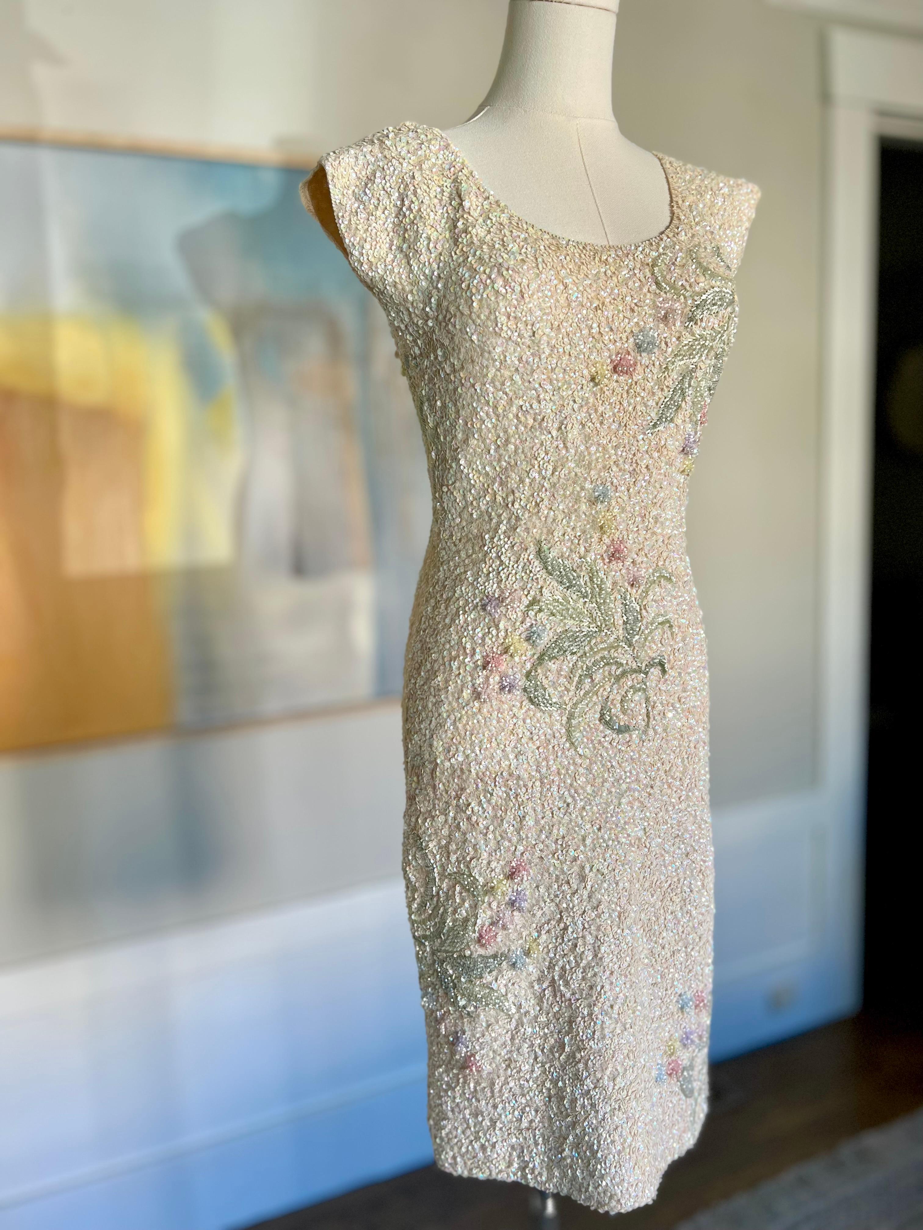 This decadent, FULLY beaded capsleeve dress is an exceptionally beautiful example of Gene Shelly's work. The hand-beaded stretch wool fabric hugs the body, making dancing a joy. This dress would be a gorgeous option for a bridal shower or could be