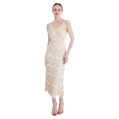 Robe vintage Gene Shelly des années 1960 en maille ivoire à sequins et franges perlées