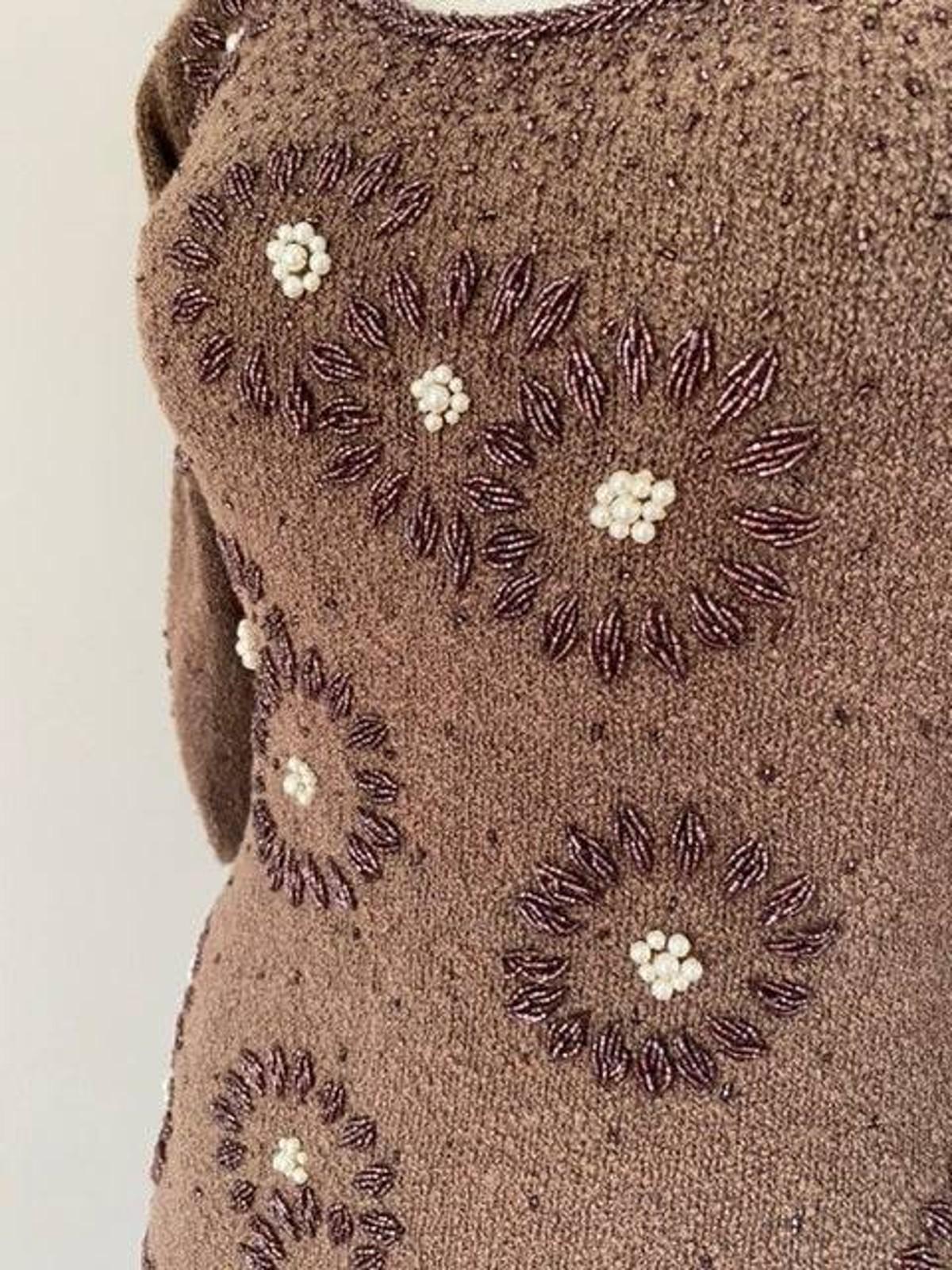 Gene Shelly 1960s evening dress in mocha bouclé accented with metallic wine-colored seed beads and faux pearls! The seed beads form a jeweled collar and graduate out to dots of beads throughout the dress. In addition, the beads and pearls come