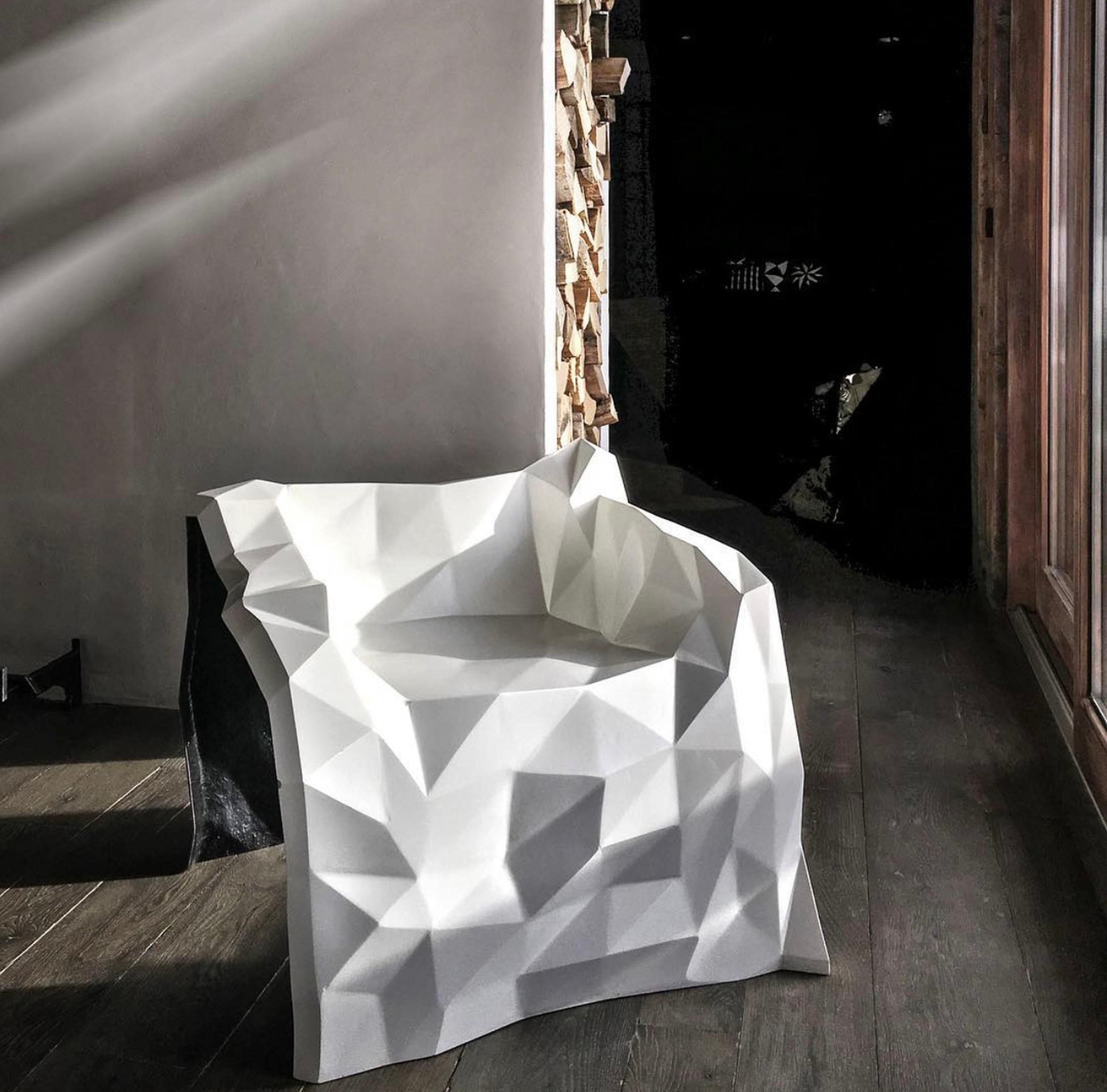 General Dynamic Chair in Fiberglass Composite by Julian Mayor
Limited Edition of 50 Pieces.
Dimensions: D 80 x W 85 x H 72 cm. 
Materials: Fiberglass composite.

Julian Mayor is a British artist and designer renowned for his sculptural works crafted