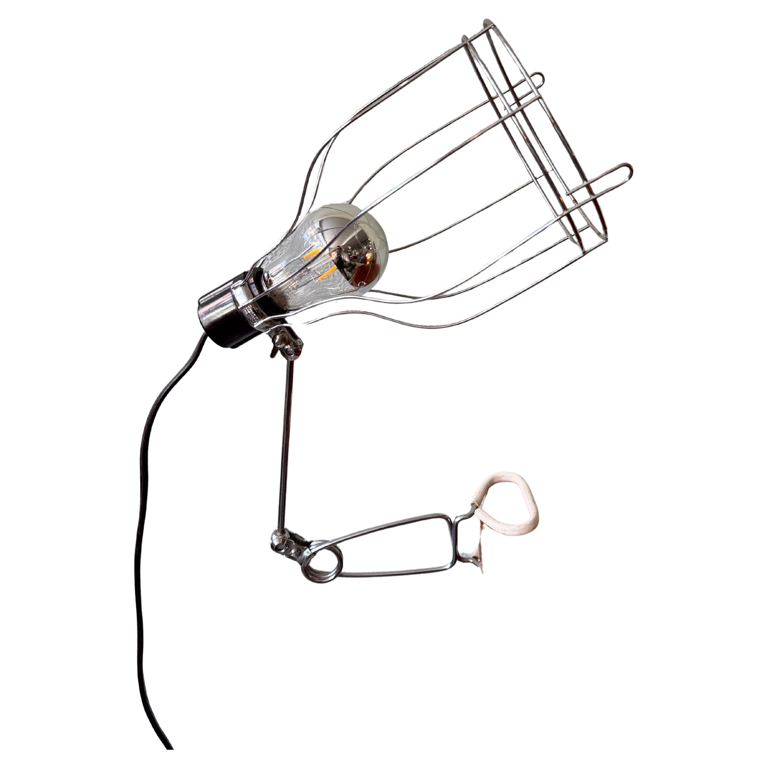 General Electric Industrial Clamp Lamp Chrome Steel Wire Cage Adjustable Arm in vendita