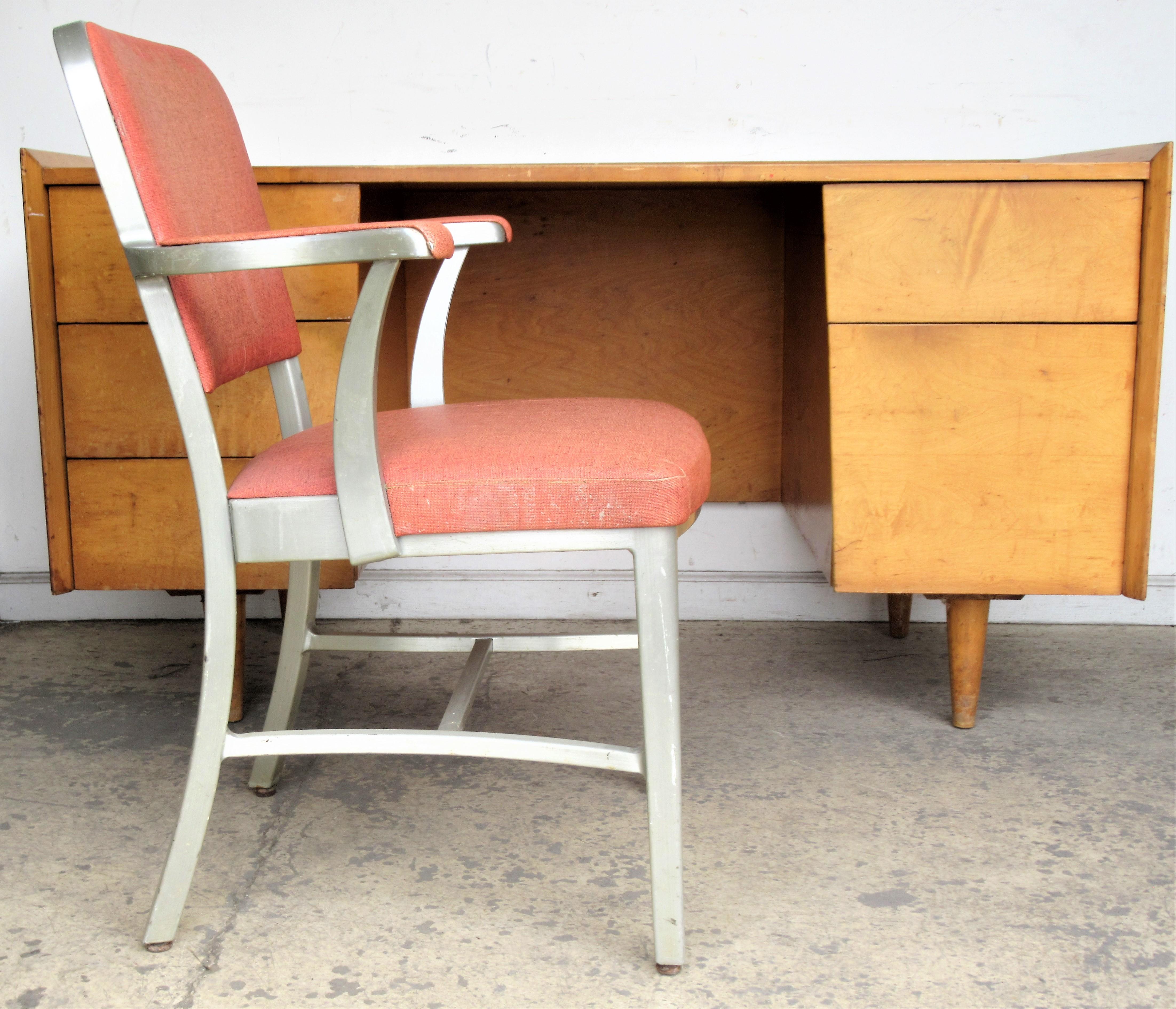 Good form industrial aluminum frame armchair in the original salmon colored polished cloth upholstery by The General Fireproofing Co. of Youngstown, Ohio, circa 1940's - 1950's. Look at all pictures and read condition report in comment section.