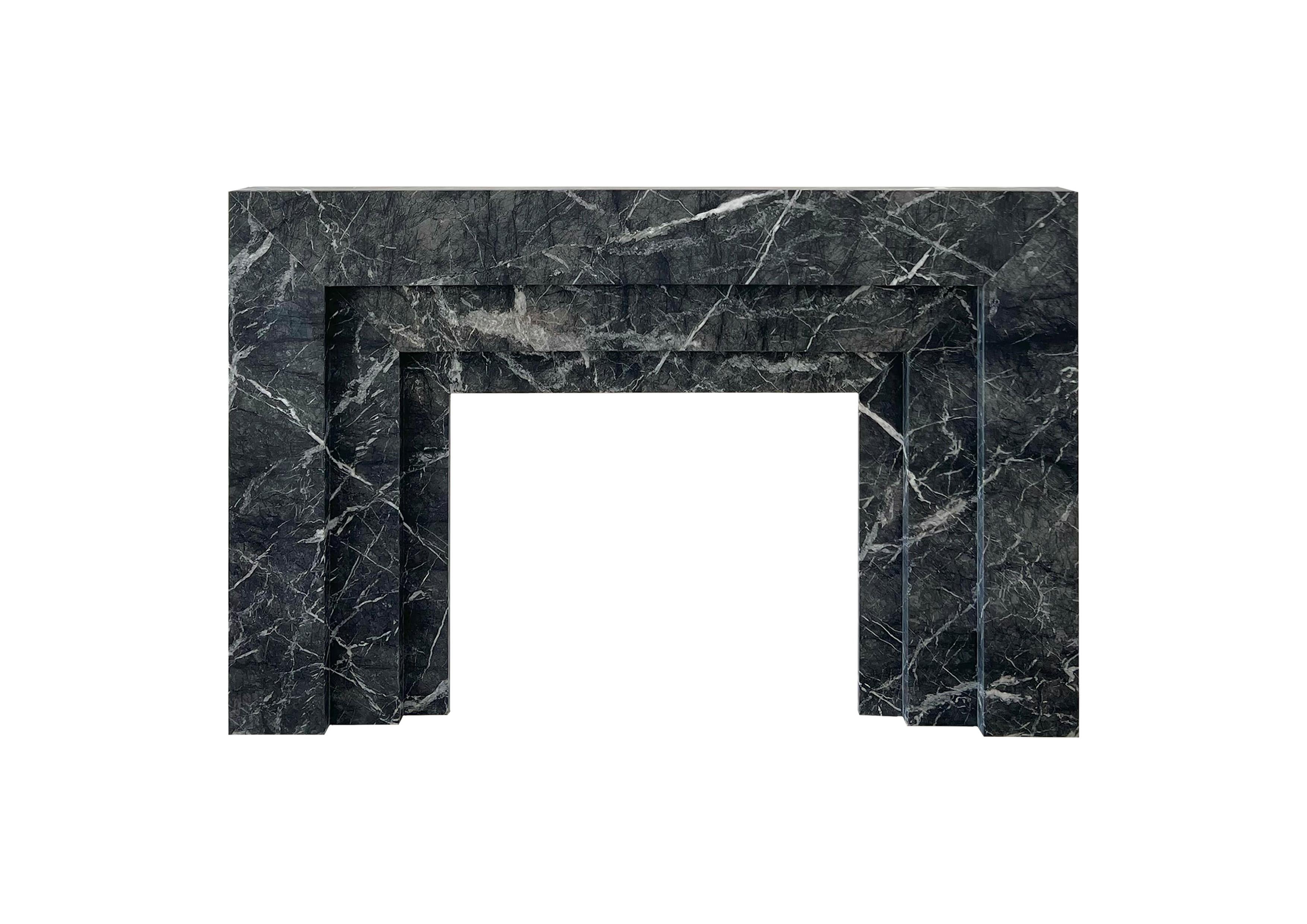 A custom made mantel produced in stunning Grigio Carnico marble by skilled craftsman in our Italian factory.

A contemporary take on an Art Deco inspired design has classic Parisian style and chic.

Bespoke sizing is available upon