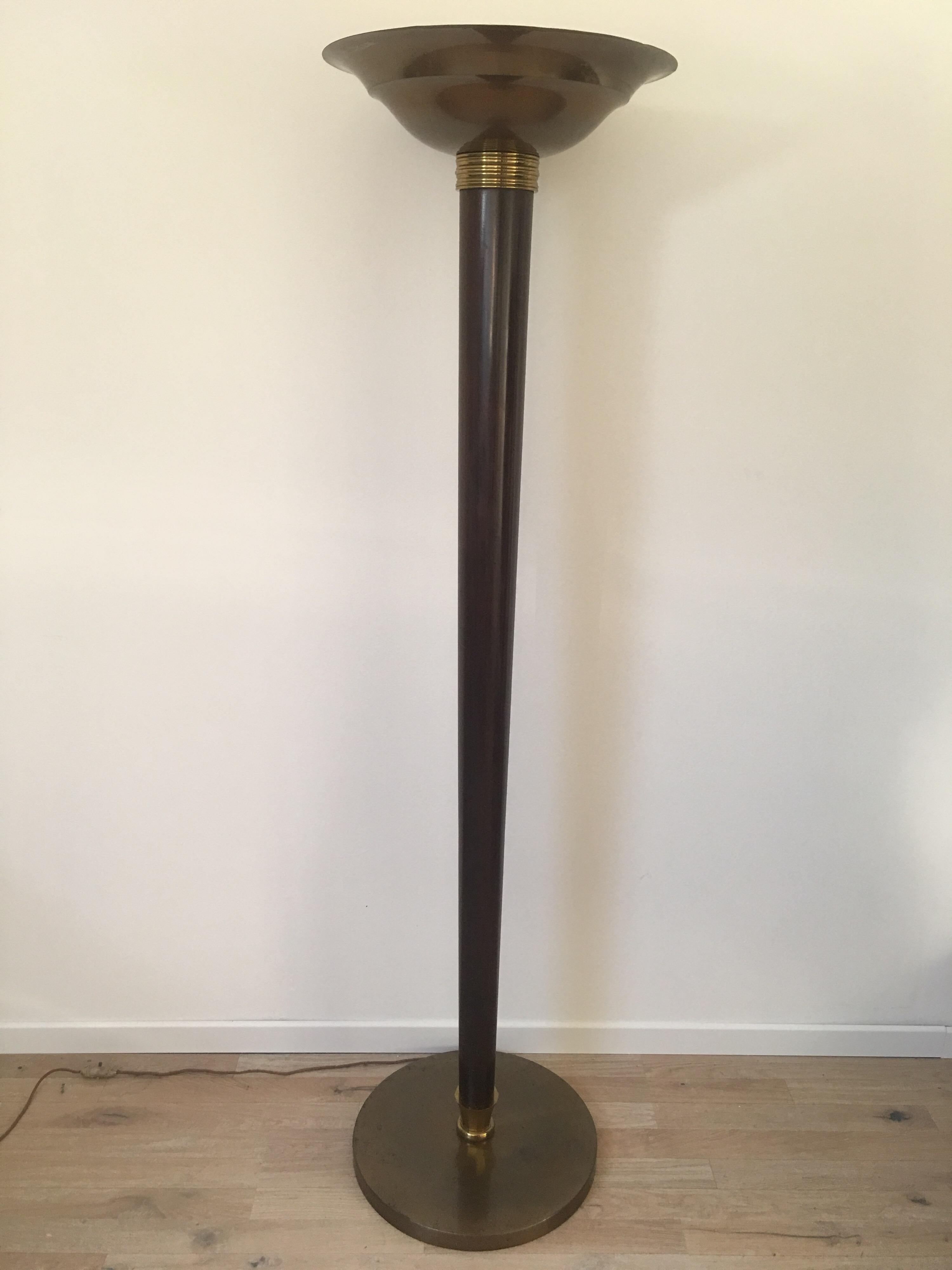 An original floor lamp wood and metal attributed to Genet and Michon, circa 1930s.
This is a rare example of French Art Deco lighting
Very good quality exotic wood and brass elements. The double patina golden brass and matte bronze makes it very