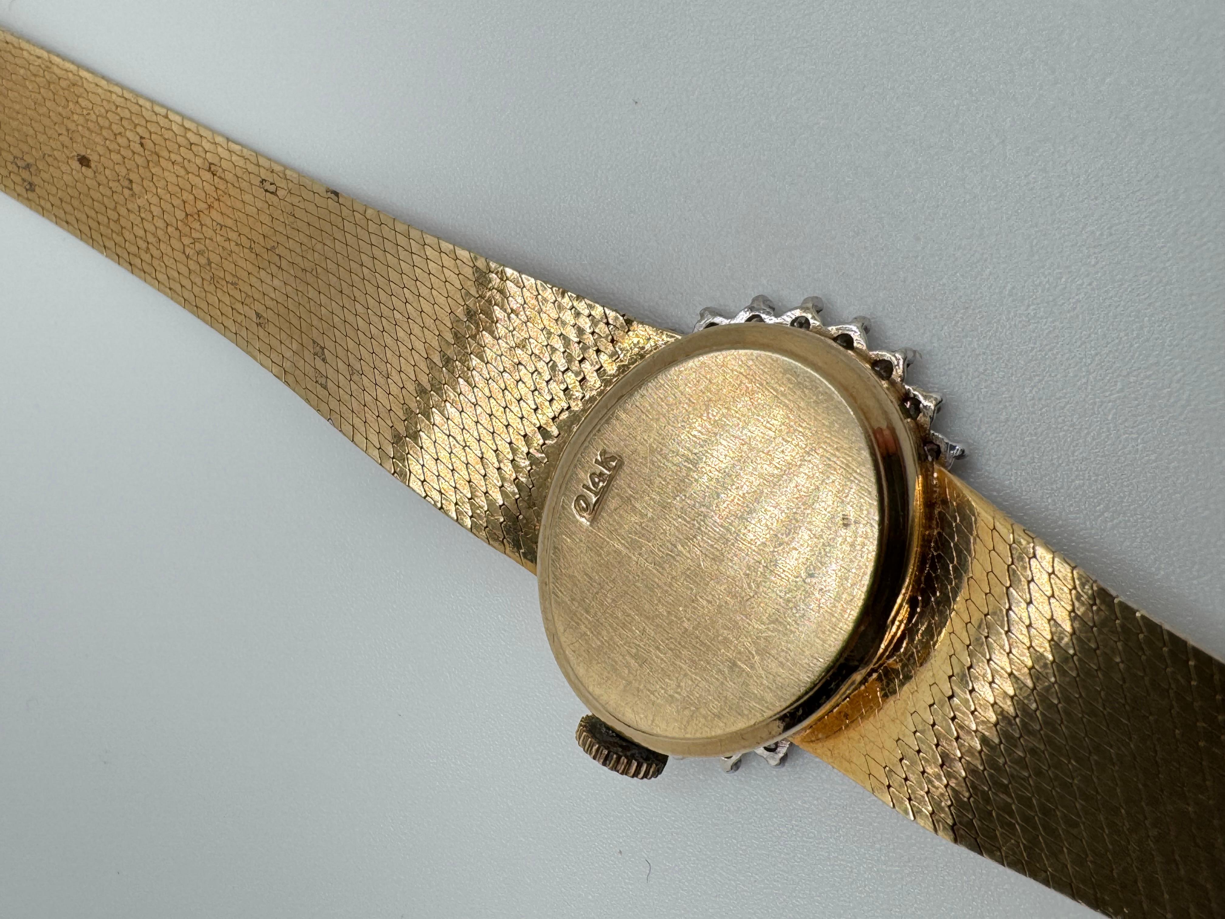 This refined Geneva, Switzerland watch combines classic design with elegant diamond detailing. This beautiful timepiece features a sparkling diamond bezel adorned with 29 round full-cut diamonds, each prong-set to enhance their brilliance. The total
