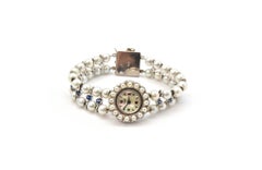Geneva Ladies White Gold Pearl Synthetic Sapphire Vintage manual wind Wristwatch