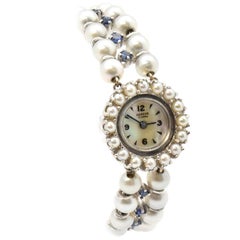 Geneva Ladies White Gold Pearl Synthetic Sapphire Vintage manual wind Wristwatch